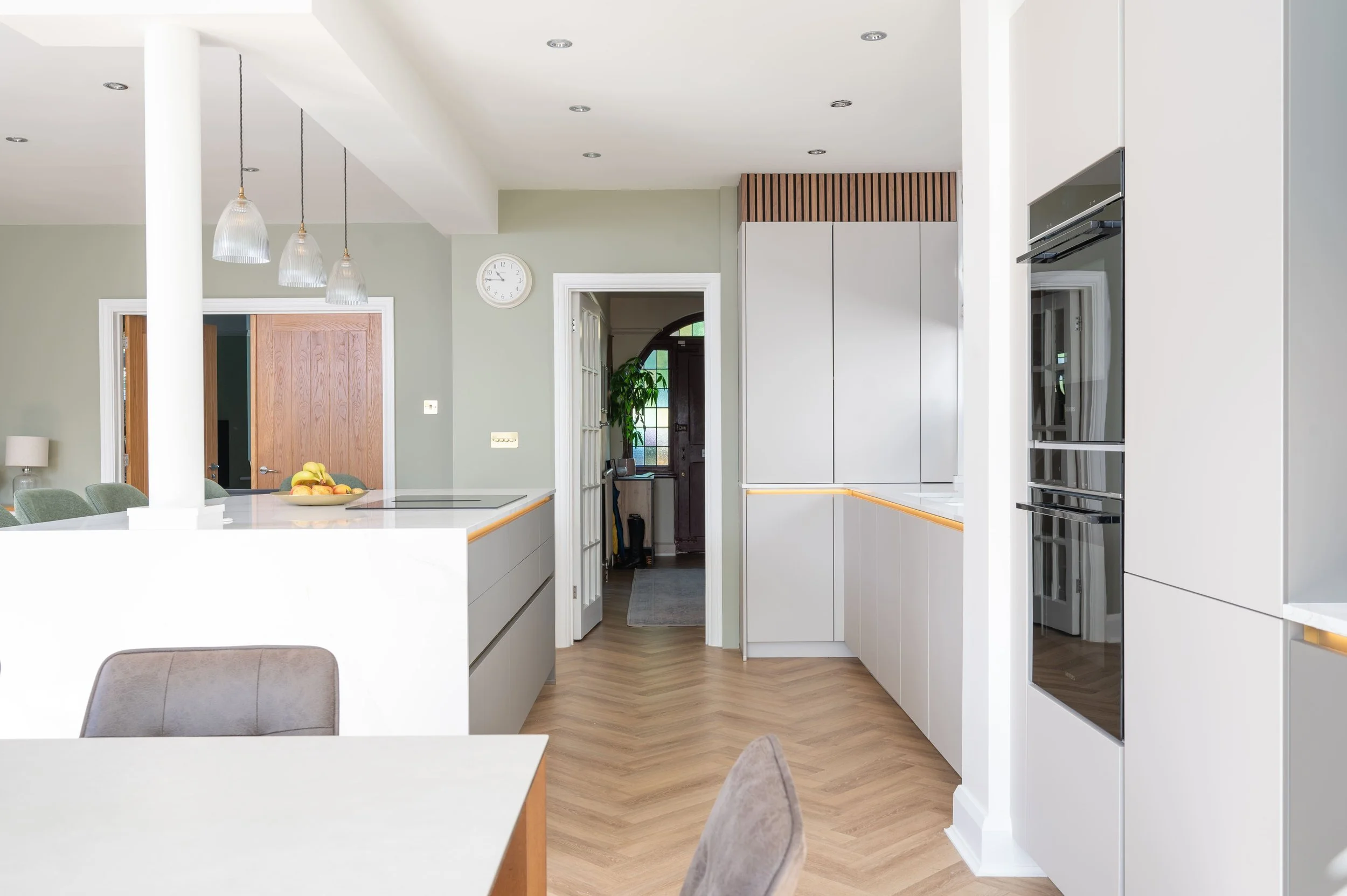 white quartz worktop in open-plan kitchen