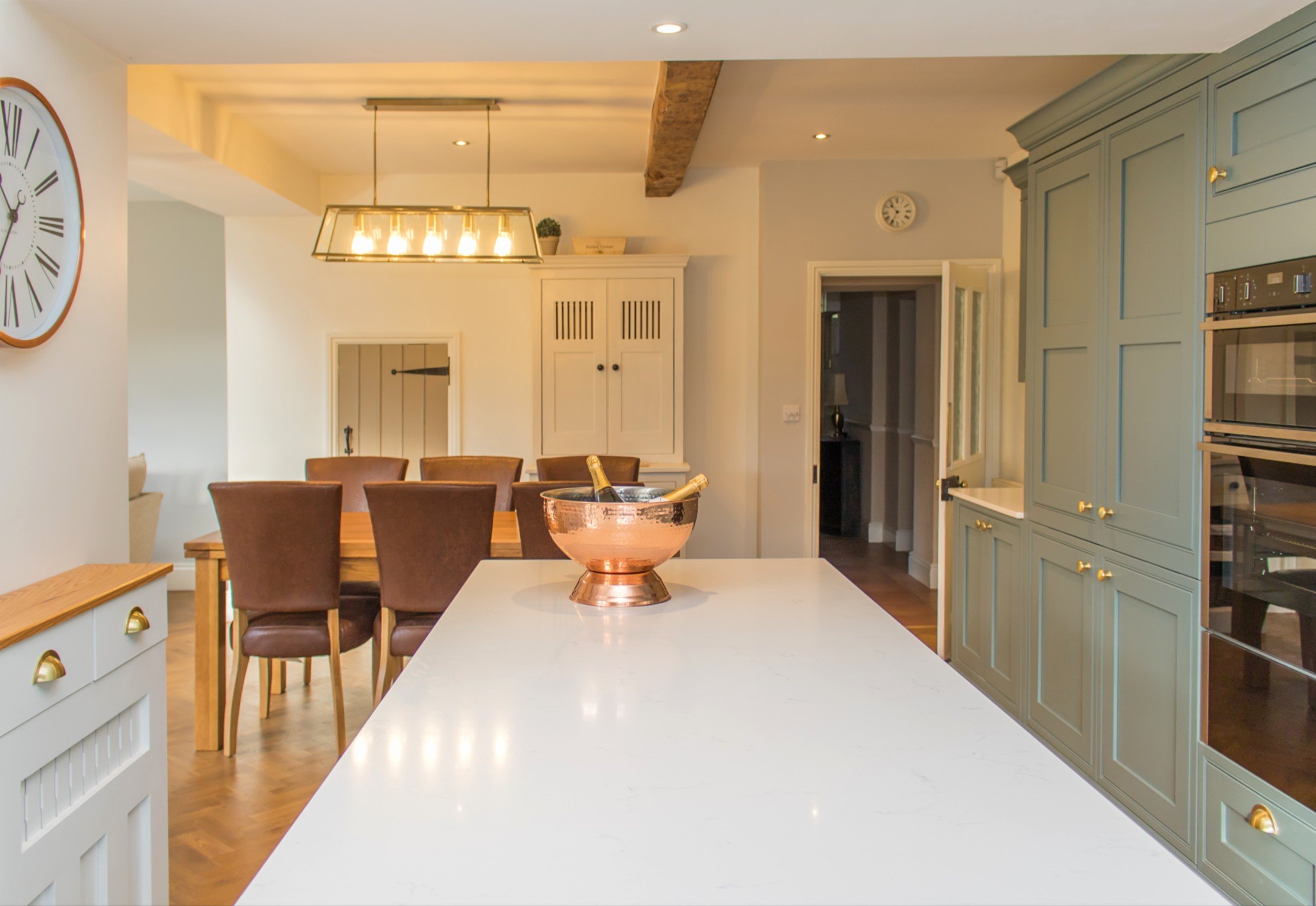 traditional shaker kitchen with white quartz worktop