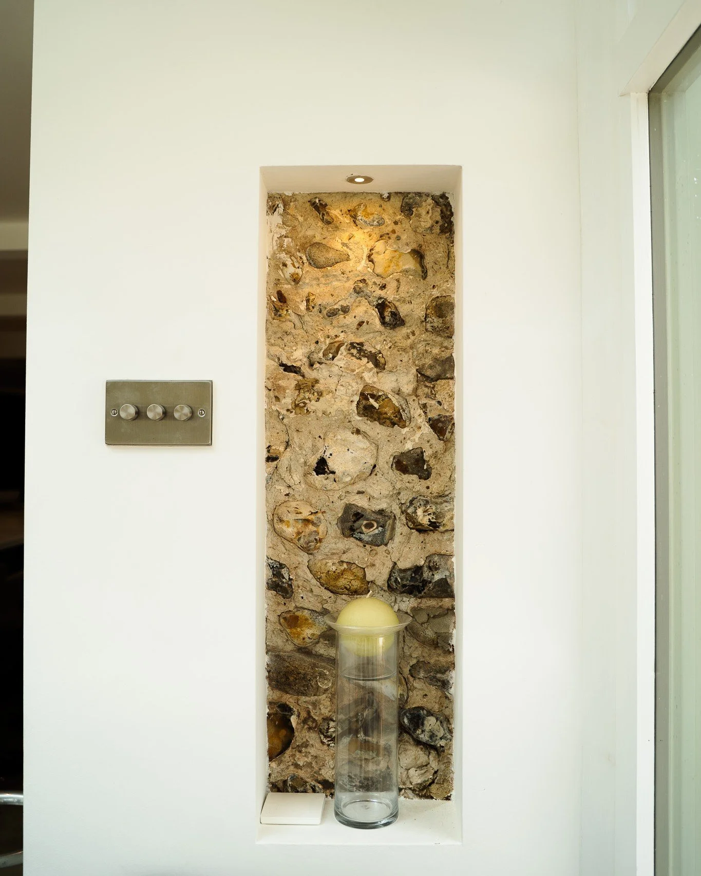 Lighting is the finishing touch that turns a house into a home, adding warmth, character, and focus to each space.

From the warm, focused wall lights that draw attention to the stunning wallpaper, to the sleek LED strip lighting that defines the bat