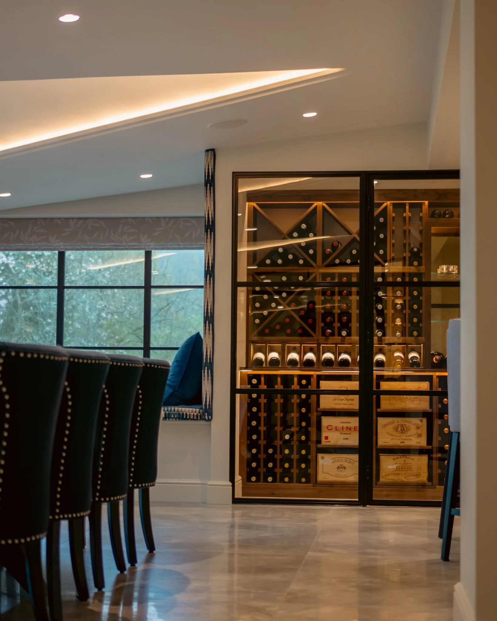 Standout feature from one of our recently completed projects&hellip; this stunning bespoke wine display, forming the centrepiece of the property&rsquo;s social and entertainment area.

The combination of feature lighting, glass detailing, and bespoke