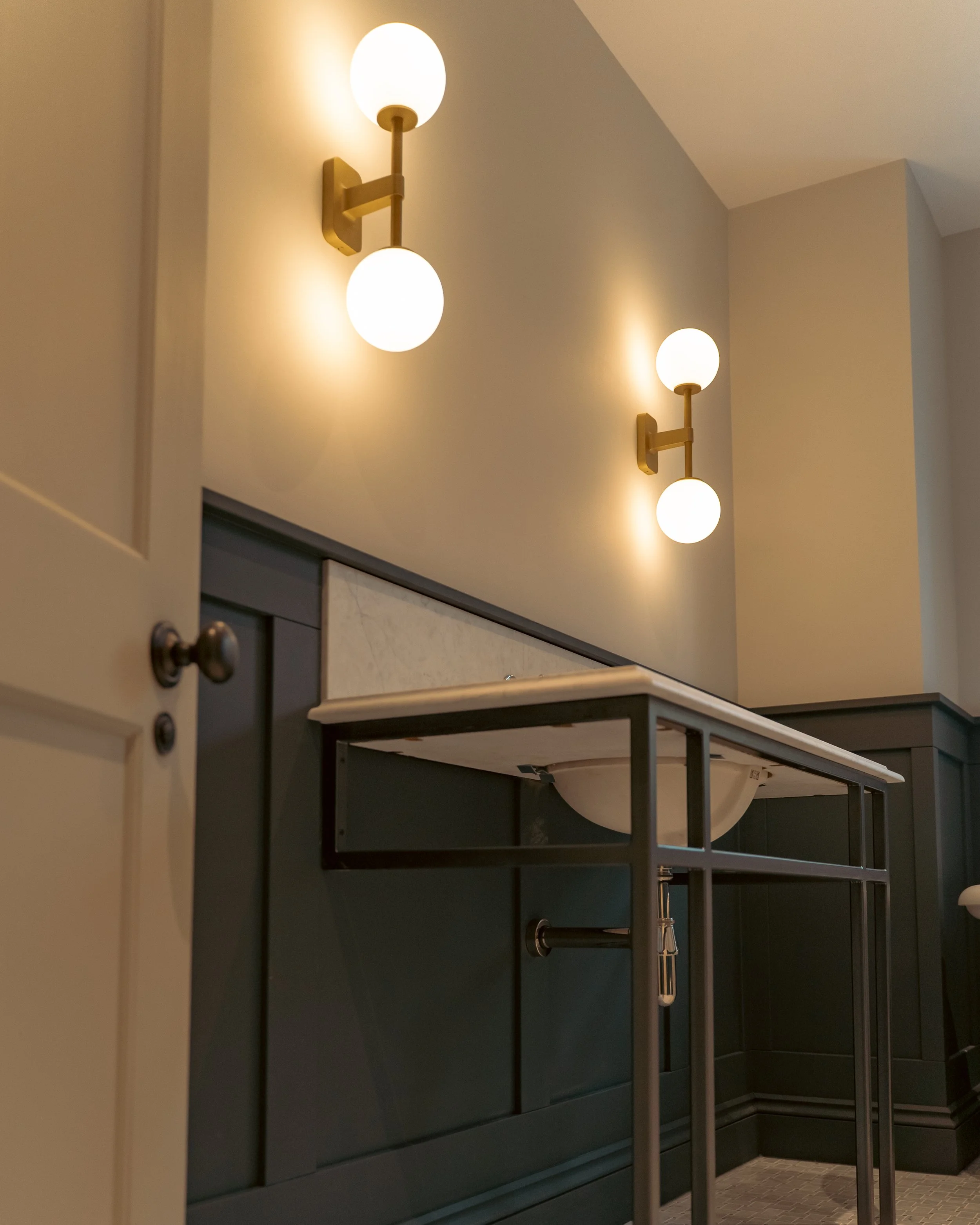 Duel mirror light fitting installed by RW electrical in a new build property within the west sussex area