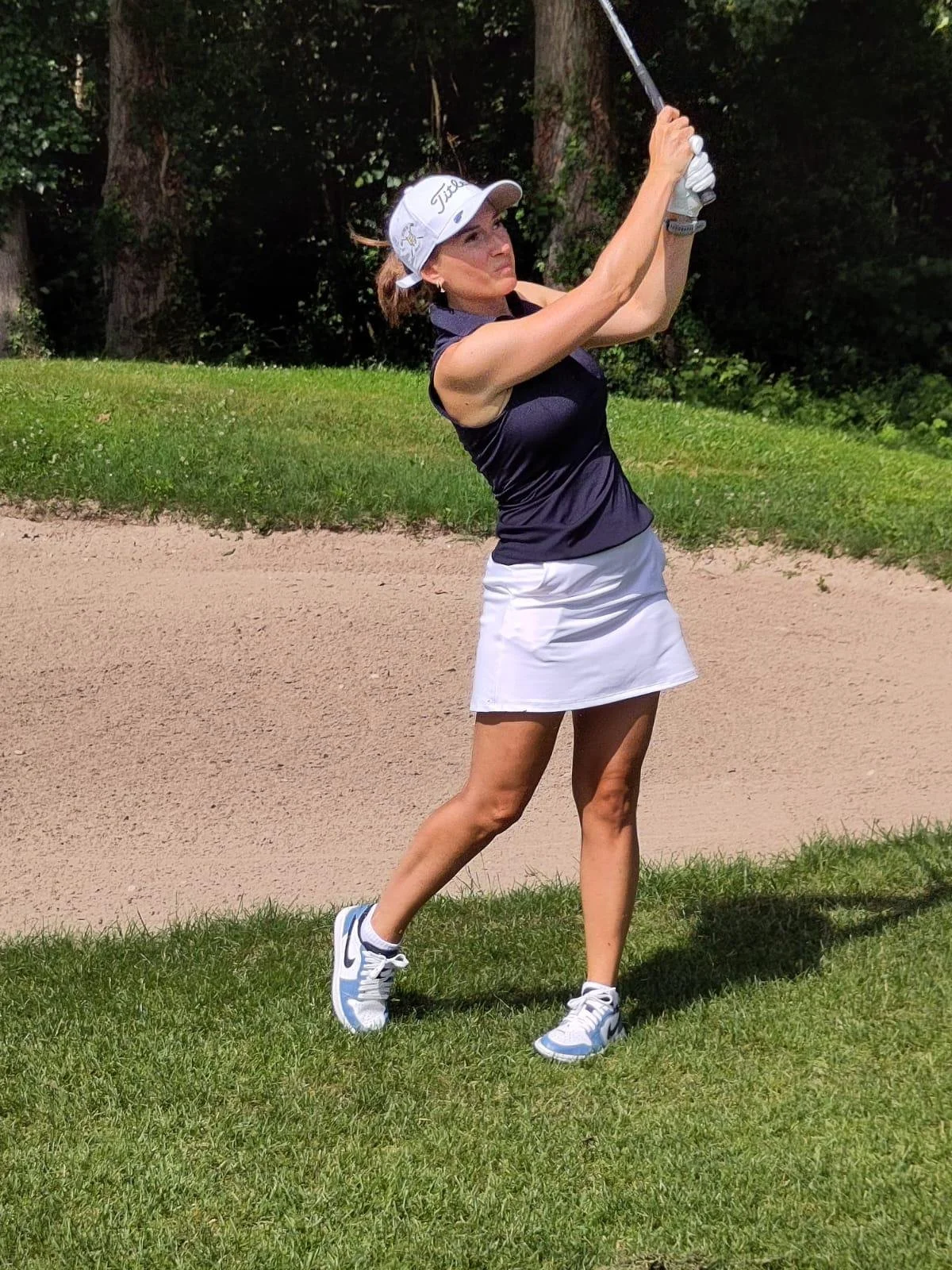 Woman playing golf