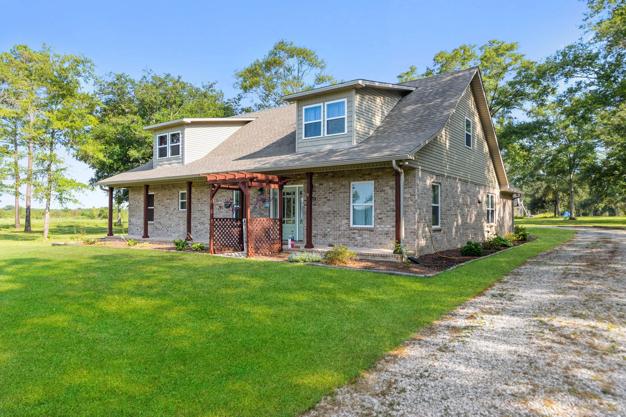 beautiful large brick home with almost 2 acres with 4 bedrooms and 3 bathrooms located in hurley mississippi and east central school district