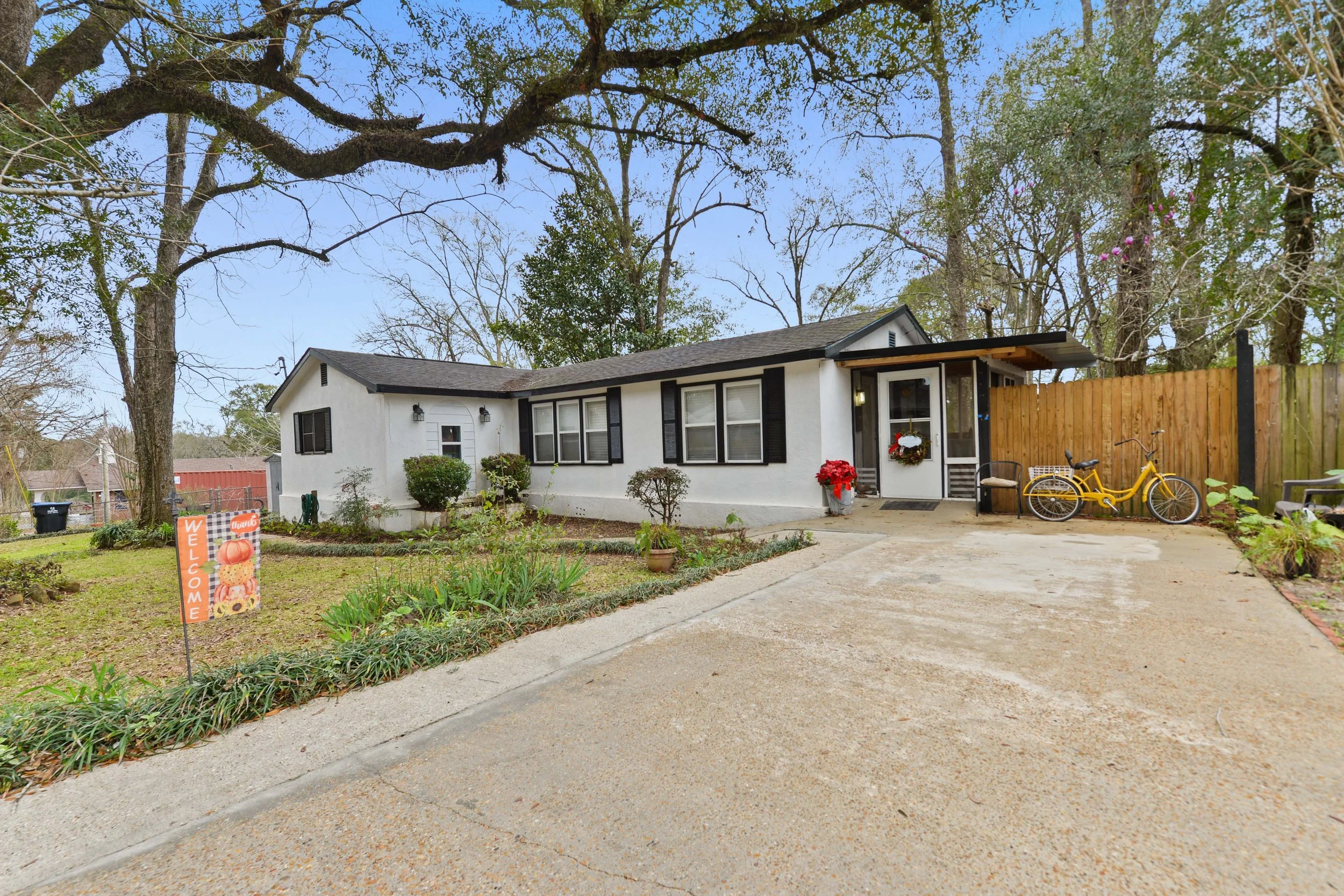 small downsized home located in city limits of lucedale ms and in george county ms with porch area, chicken coop, outdoor shed & backyard with fence