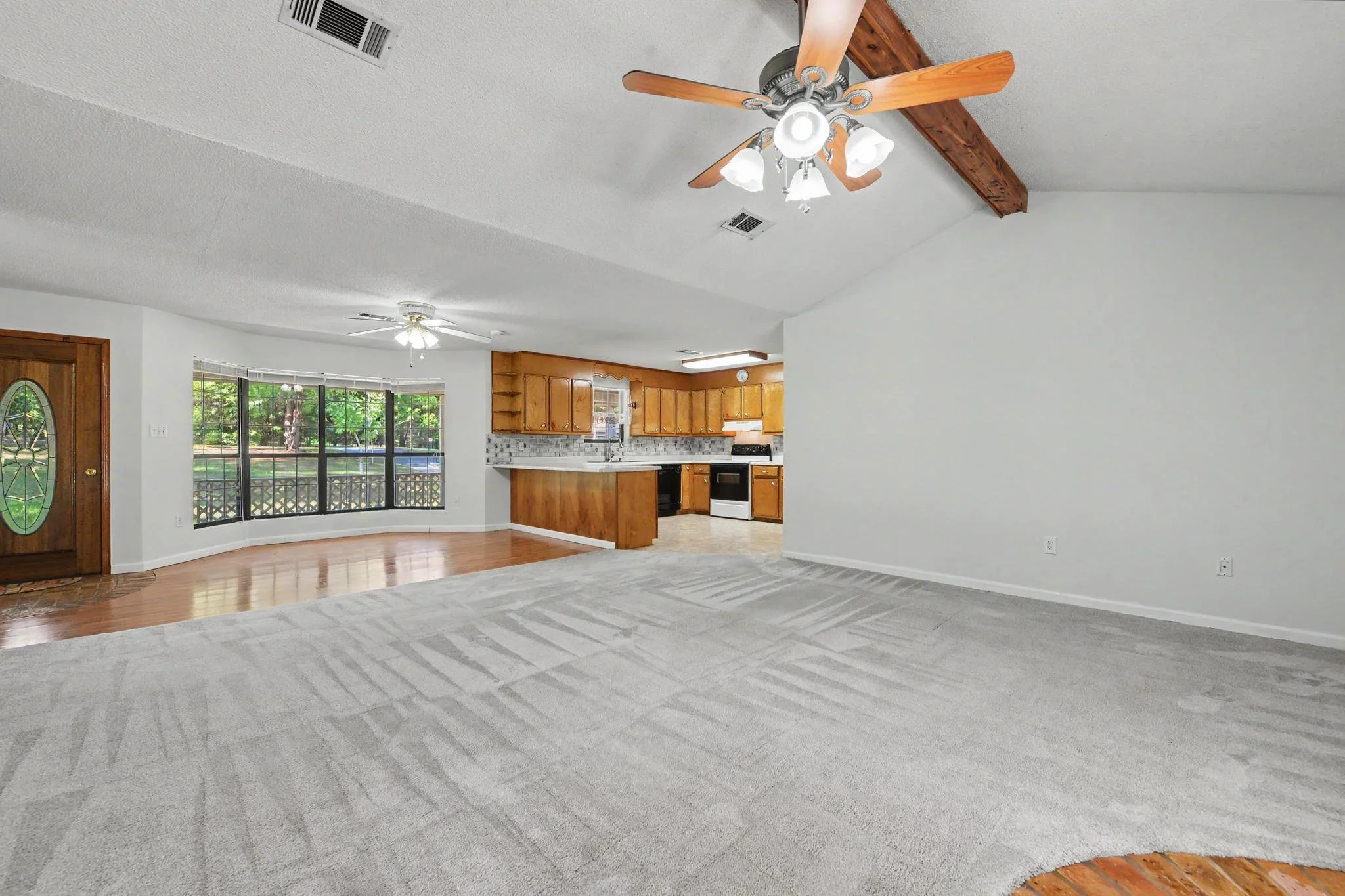 3 bedroom 2 bathroom home in lucedale mississippi in george county ms older home with white lattice on the front porch and has 2 acres beautiful home with wooden trim and accents