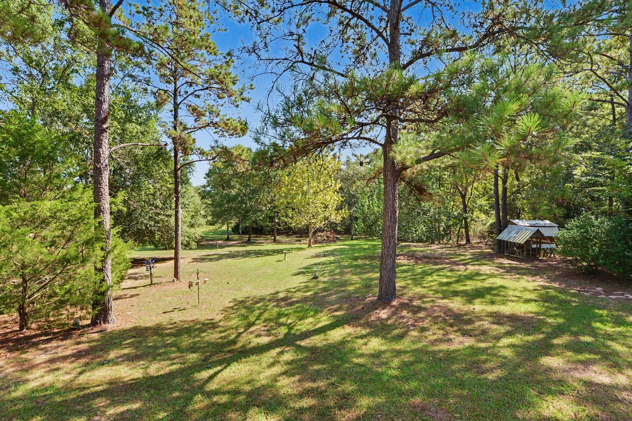 3 bedroom 2 bathroom home in lucedale mississippi in george county ms older home with white lattice on the front porch and has 2 acres beautiful home with wooden trim and accents