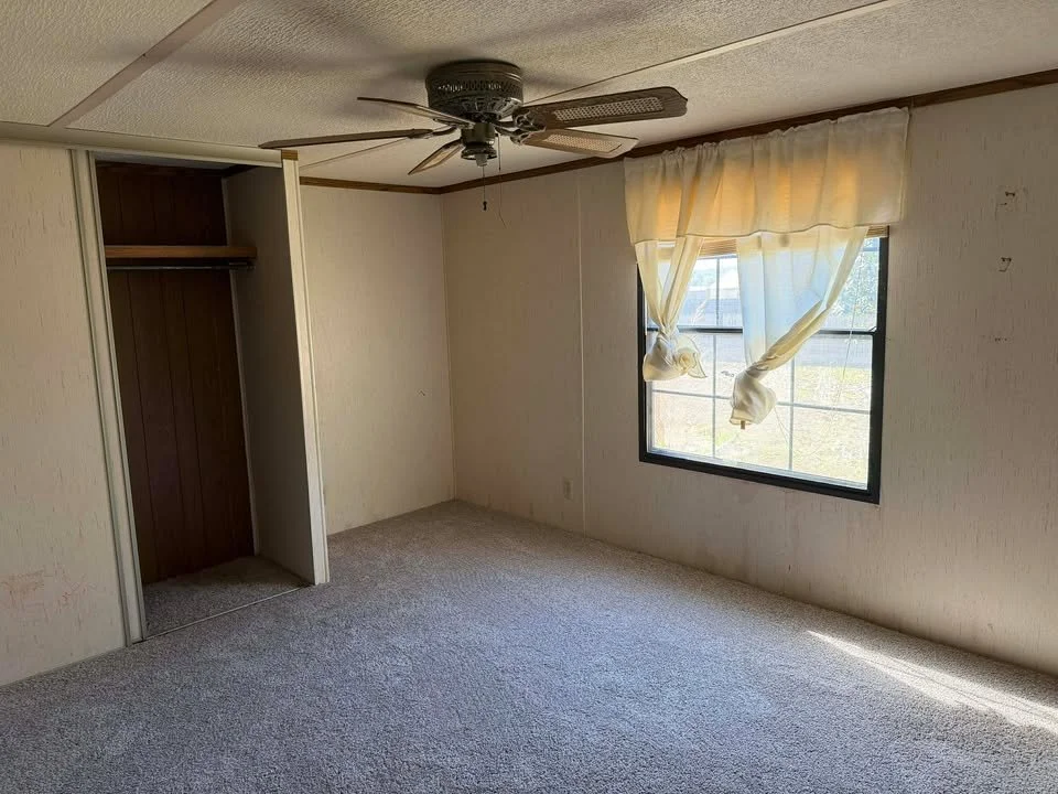 small trailer with 3 bedrooms and and 2 baths and move-in ready and perfect for investment or a starter family or downsizing and located on 1.77 acres