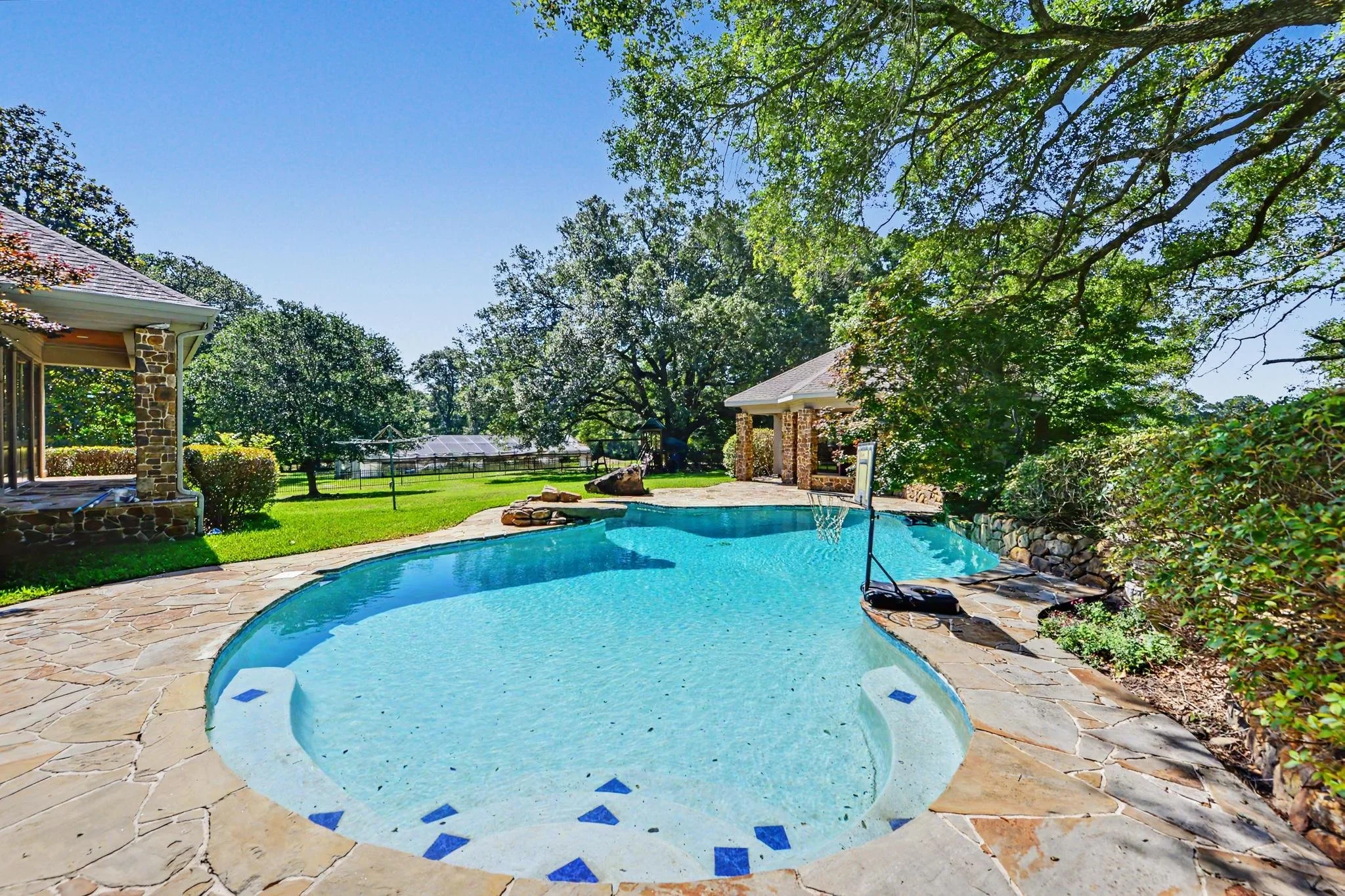 large home with 20 acres stone siding and walkway with guest house and gunite salt water pool located in agricola mississippi in george county ms
