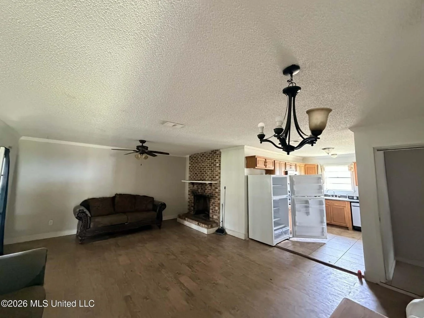 brick home inside lucedale city limits with 3 bedrooms three bedrooms and 2 bathrooms two bathrooms and a brick fireplace with a nice back porch