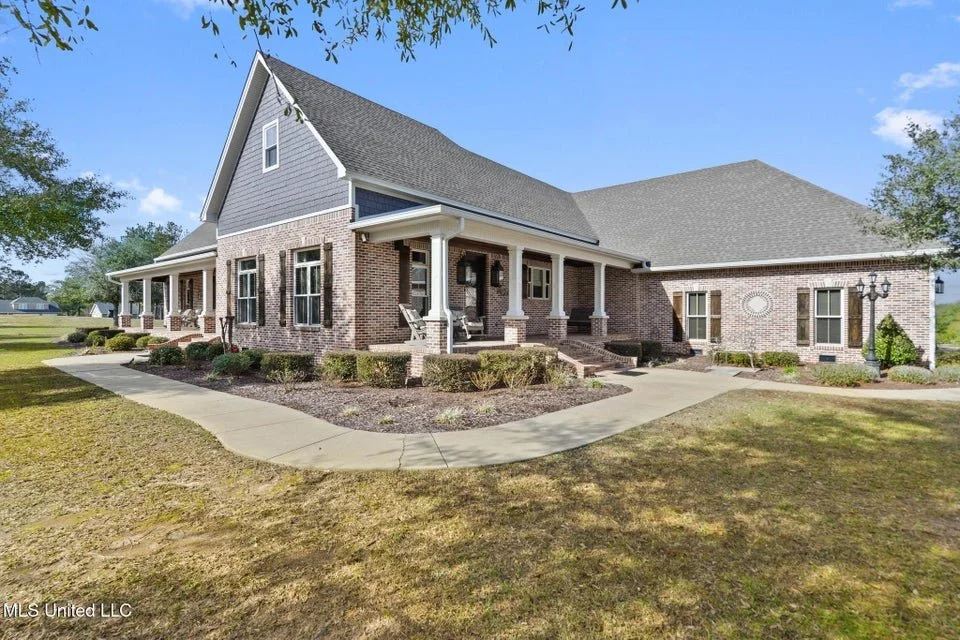 Less than 10 year old southern craftsman farmhouse style home for sale by Karen Wright at Karen Wright Realty in George County, MS.