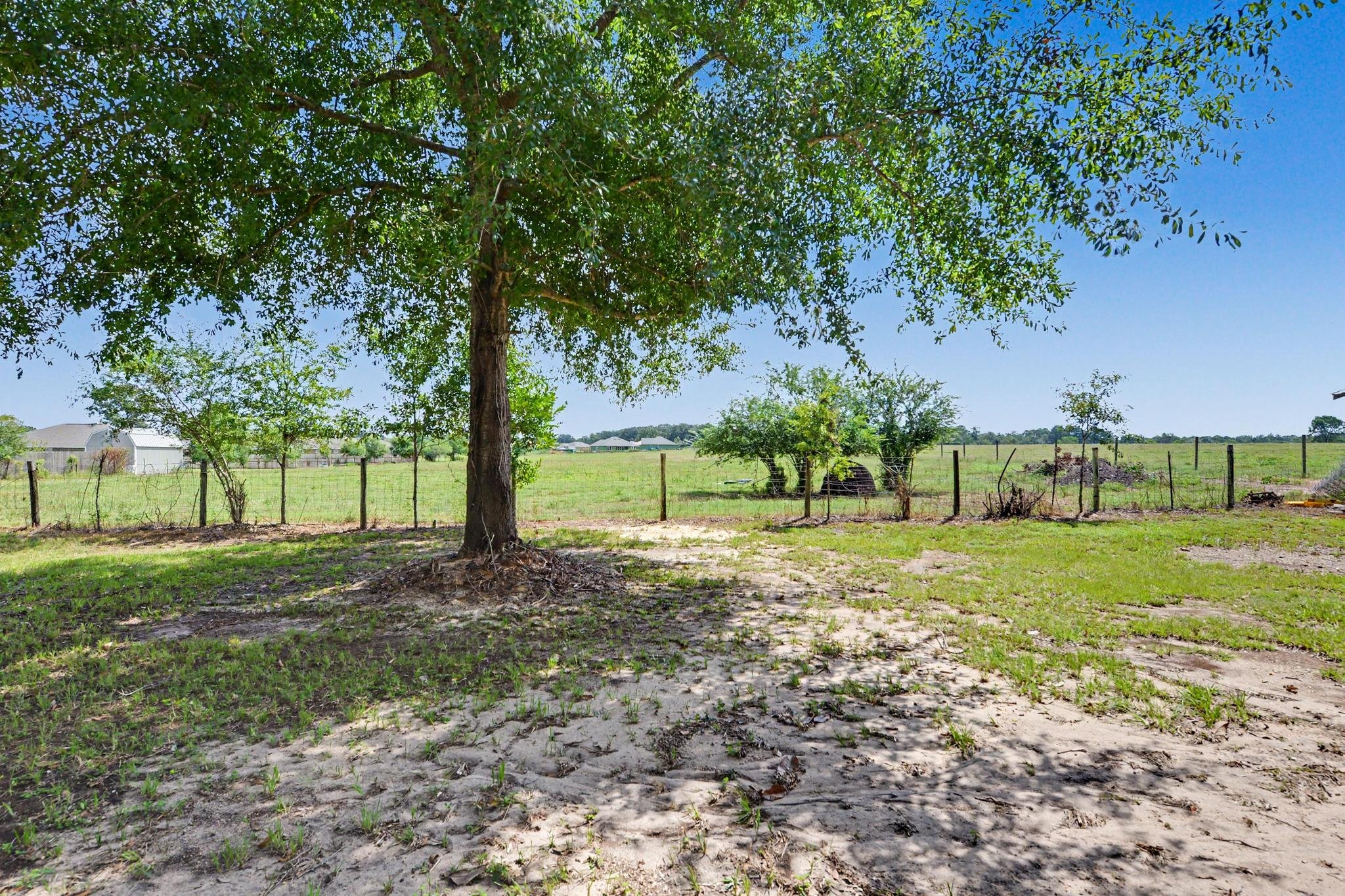 old white farmhouse with four acres and 3 bedrooms and 1 bathroom and a blue kitchen located in lucedale mississippi located in george county mississippi with 3 bedrooms and 1 bath