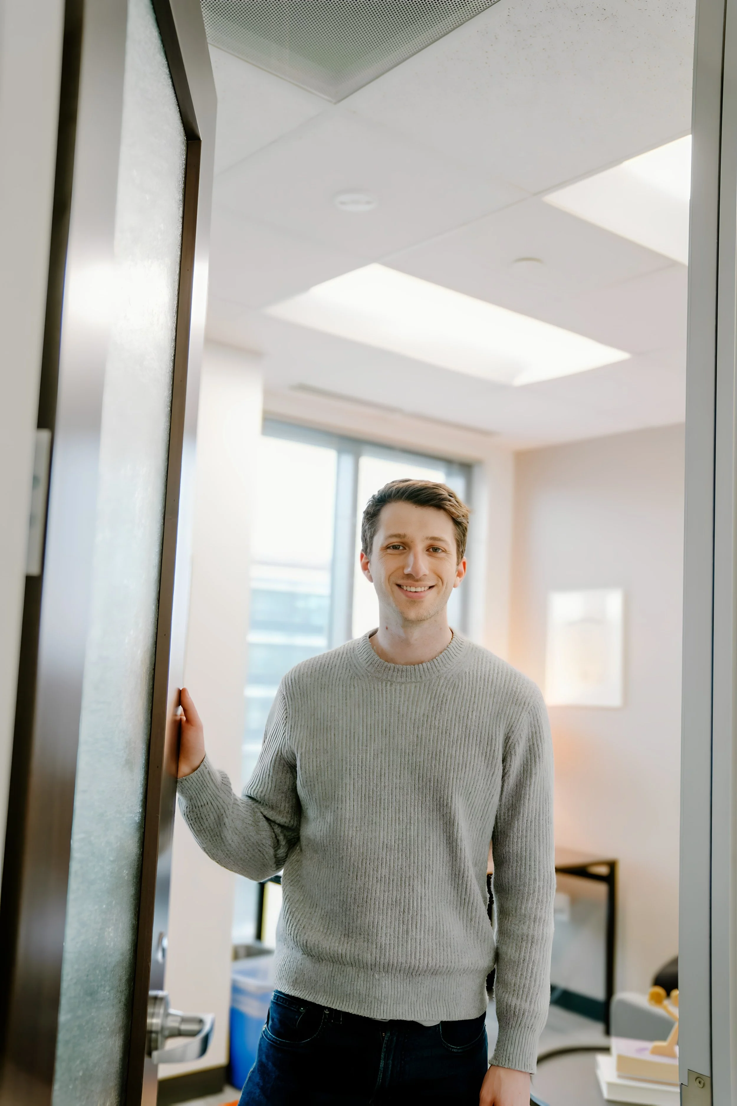 Ben Sollenberger, men's mental health counselor, at his therapy office in Arlington, Virginia