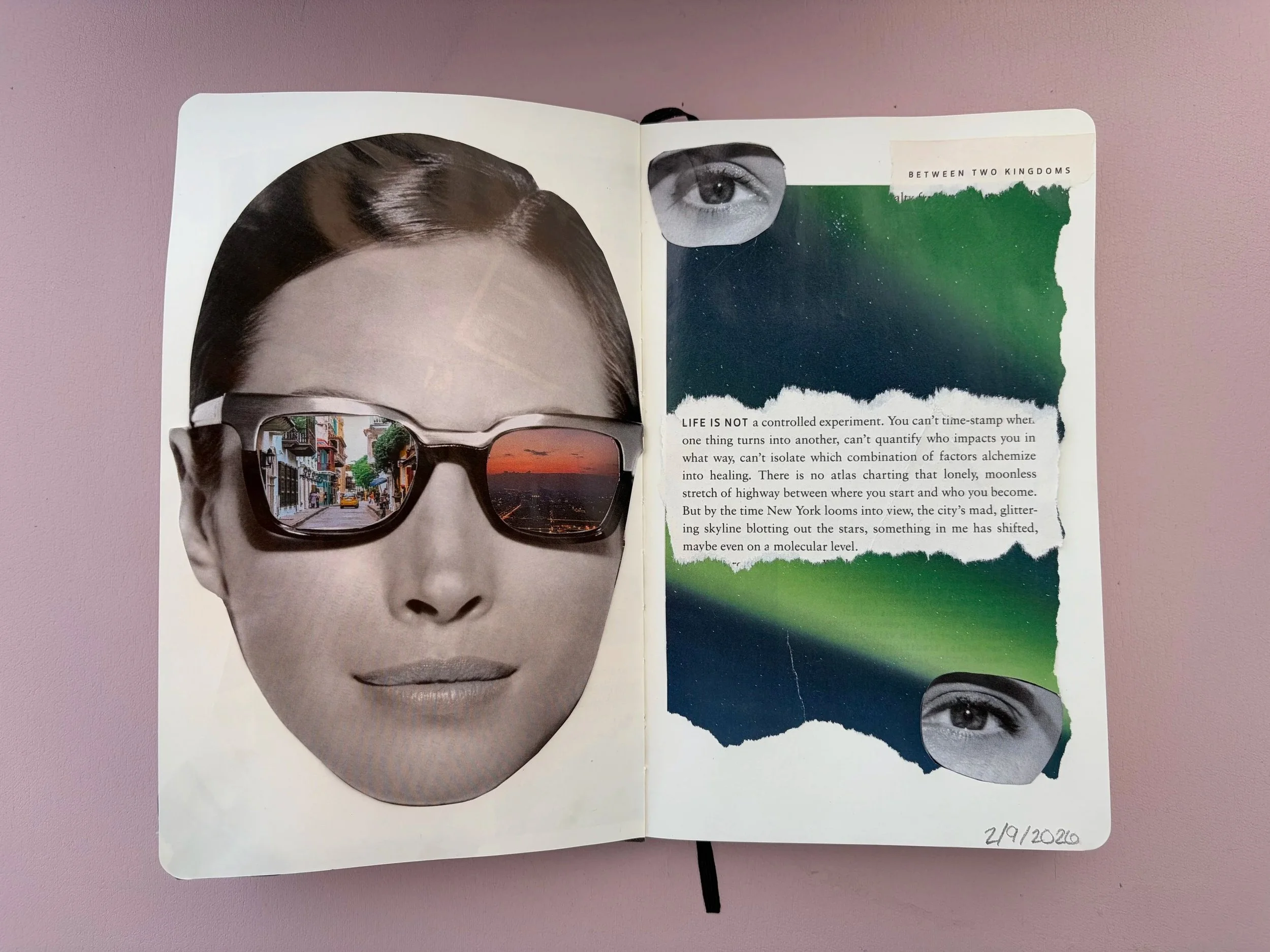 Open journal with collage of black and white woman's face wearing sunglasses on the left page, showing city street reflection, and torn paper with Aurora Borealis and eye images, with text about life's unpredictability on the right page.