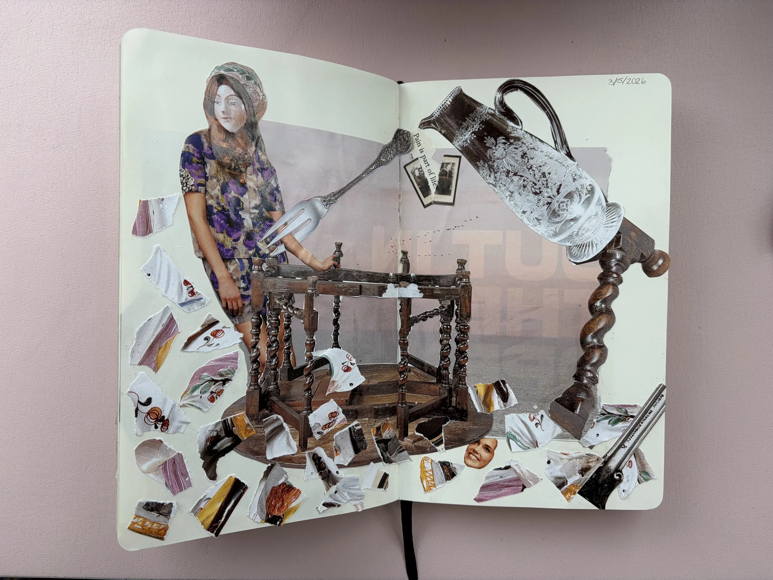 A collage featuring a woman in a floral dress, a torn piece of paper in the shape of a fork, a large ornate glass jug, and a vintage wooden table with scattered torn paper pieces and a ruler, all arranged on an open notebook on a pink surface.