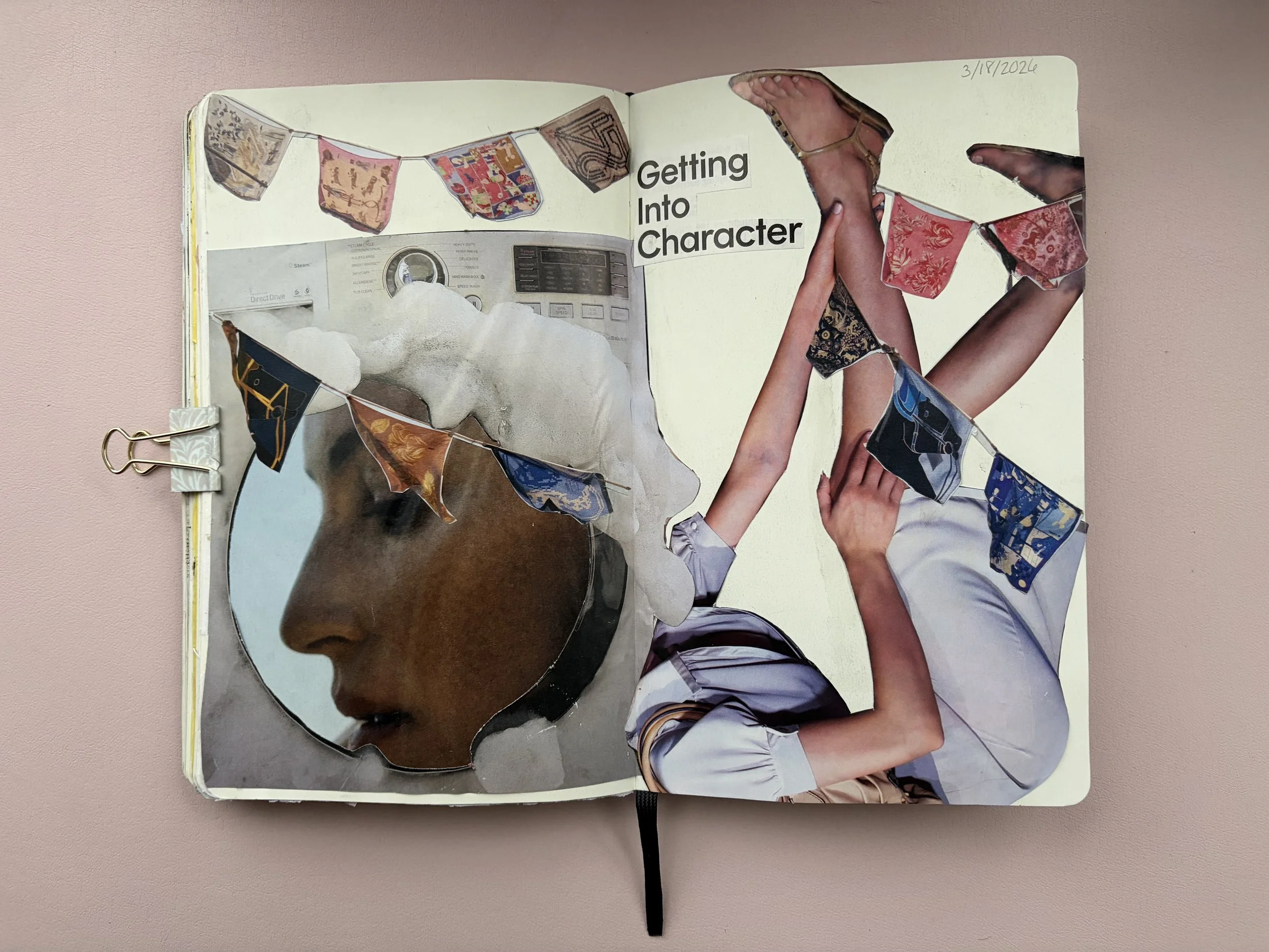 Collage art in a journal with cut-out photos and images, featuring the text 'Getting Into Character,' a profile of a person's face with foam on their head, hands in different positions, and fabric pieces in a geometric arrangement.