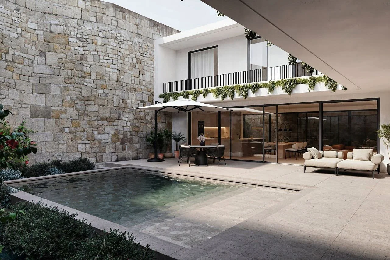 Who else would love to dive into this paradise?

Our 3D rendering features a beautifully designed Mediterranean-style home, surrounded by towering stone walls that provide privacy. The exterior of the home boasts a clean and modern look, with walls f
