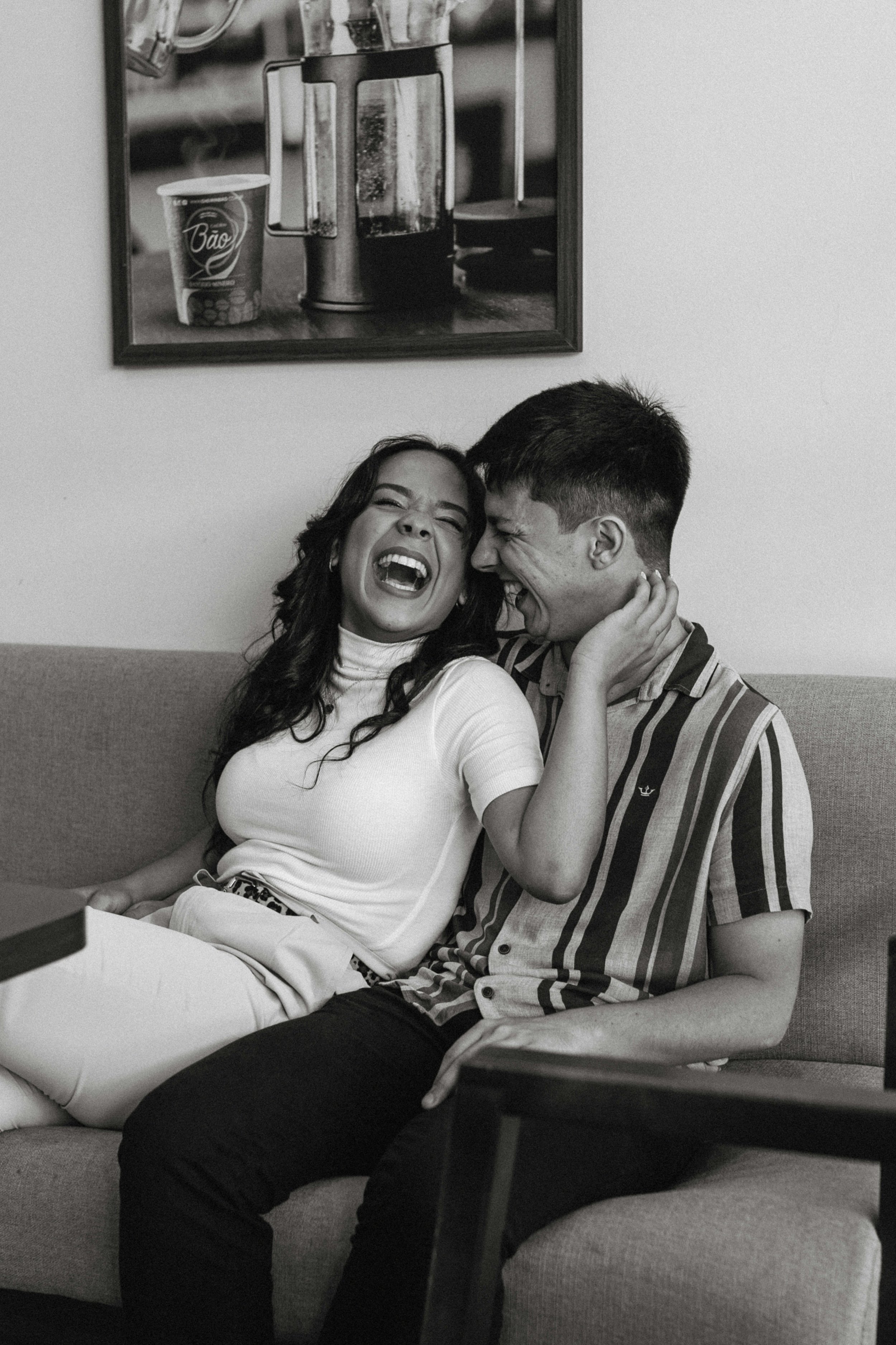 Partners laughing in couples therapy to reconnect, near me