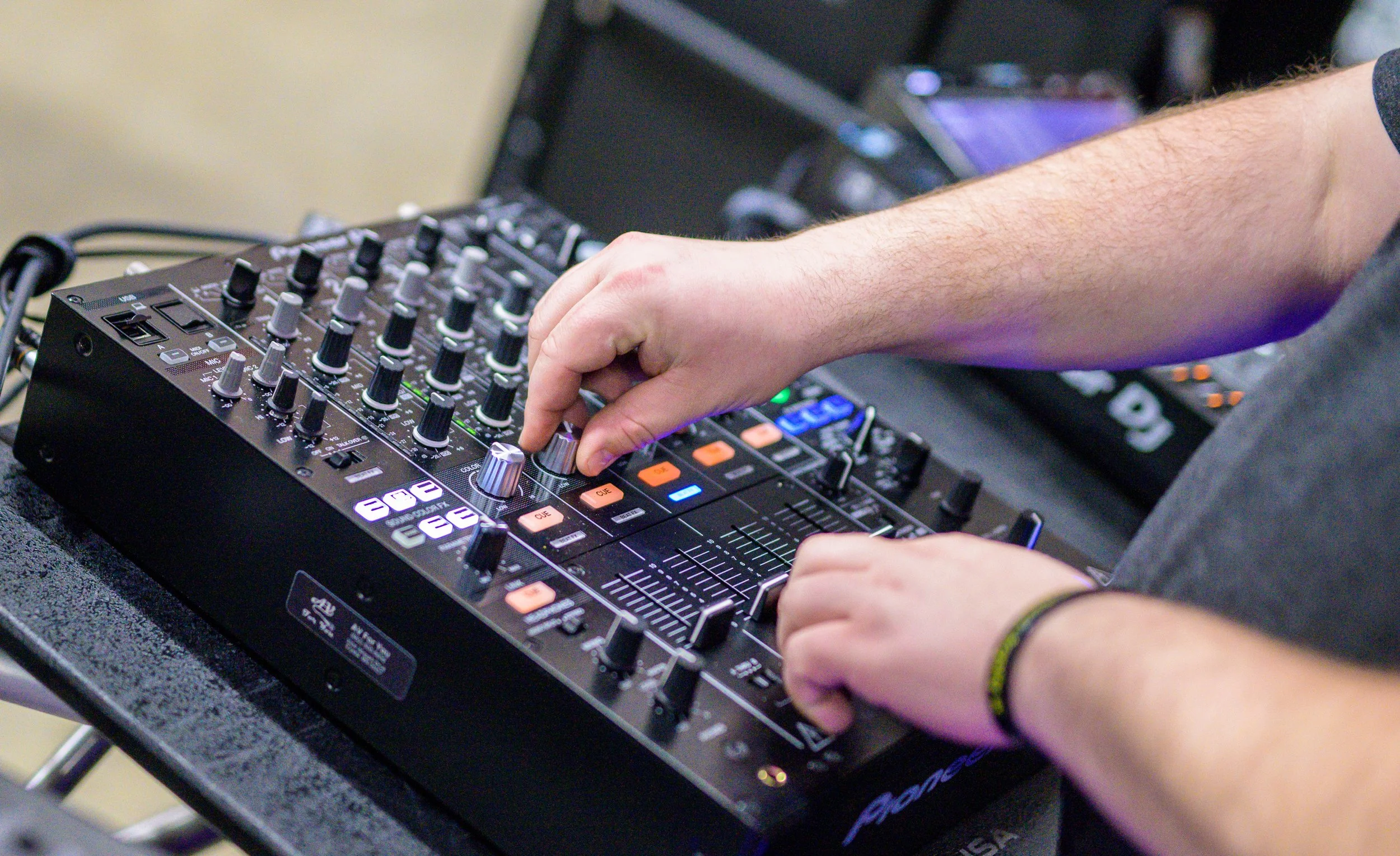 Adjusting a sound board.