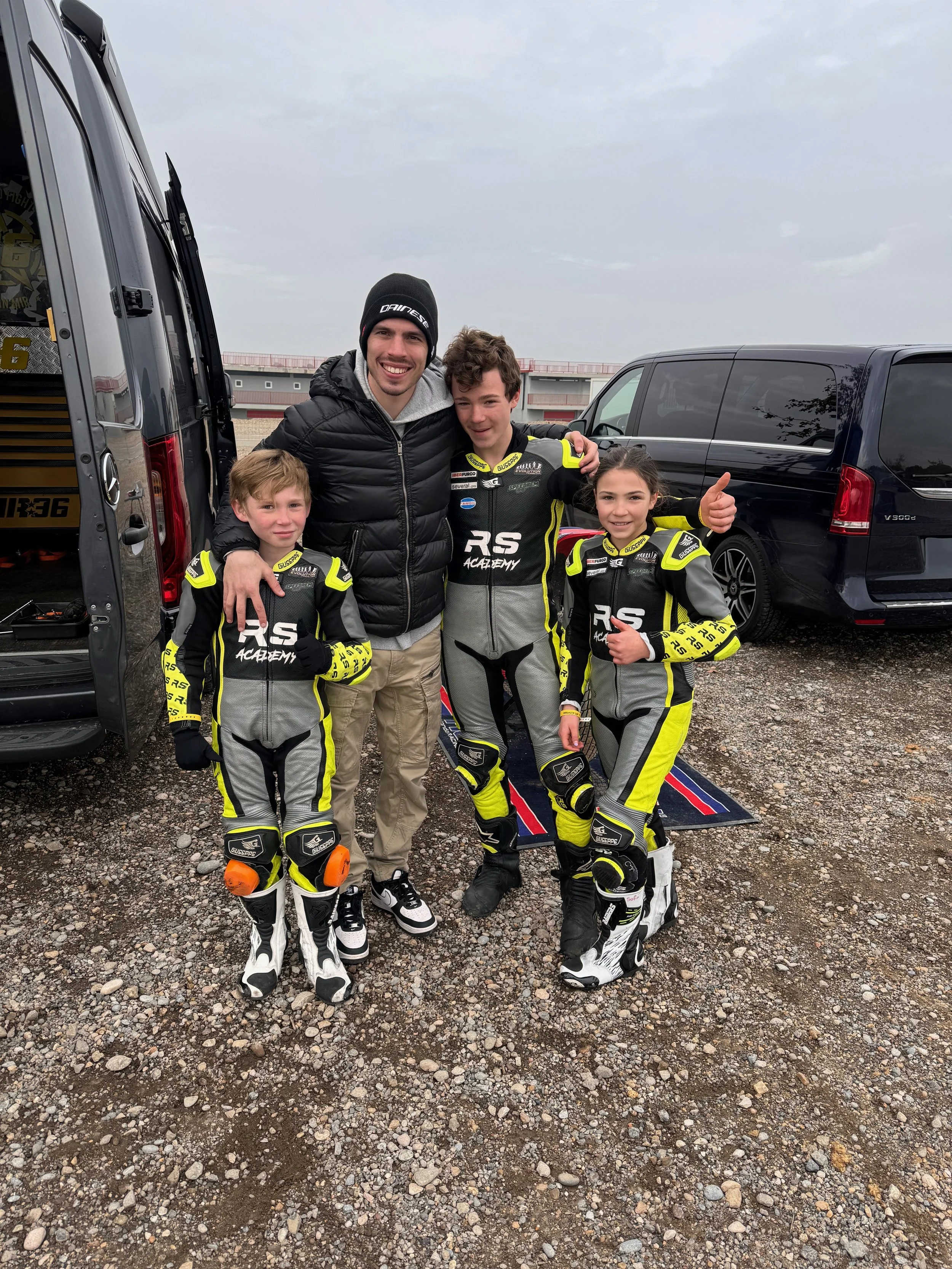 Oliver, Sebastian, and Sofia Dear with MotoGP World Champion Joan Mir at the Circuit Alcarràs