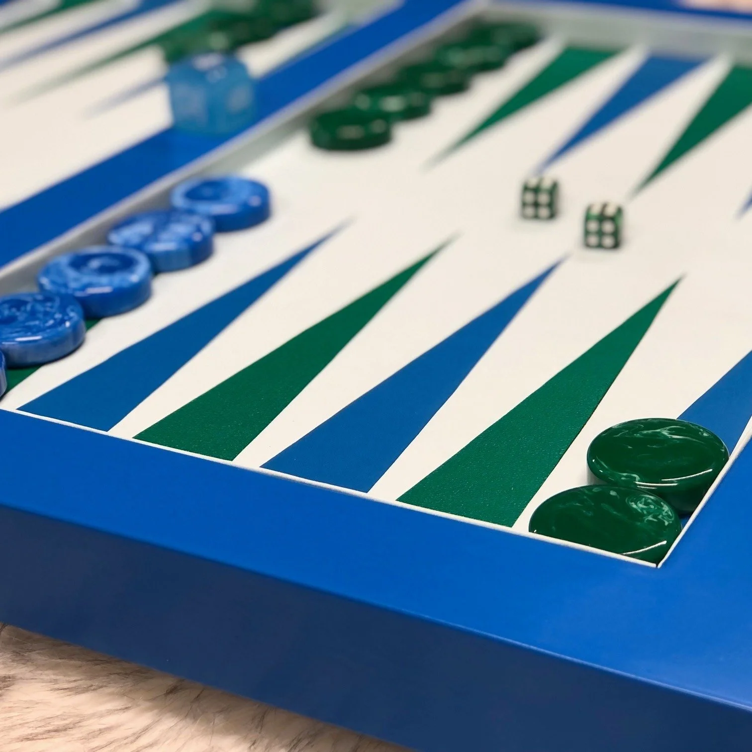 Yes, we love getting fabric swatches and paint chips as inspiration for a custom backgammon board or table.  There are so many elements that comprise one of our pieces including the wood itself, the playing surface comprised of 3 or 4 different color