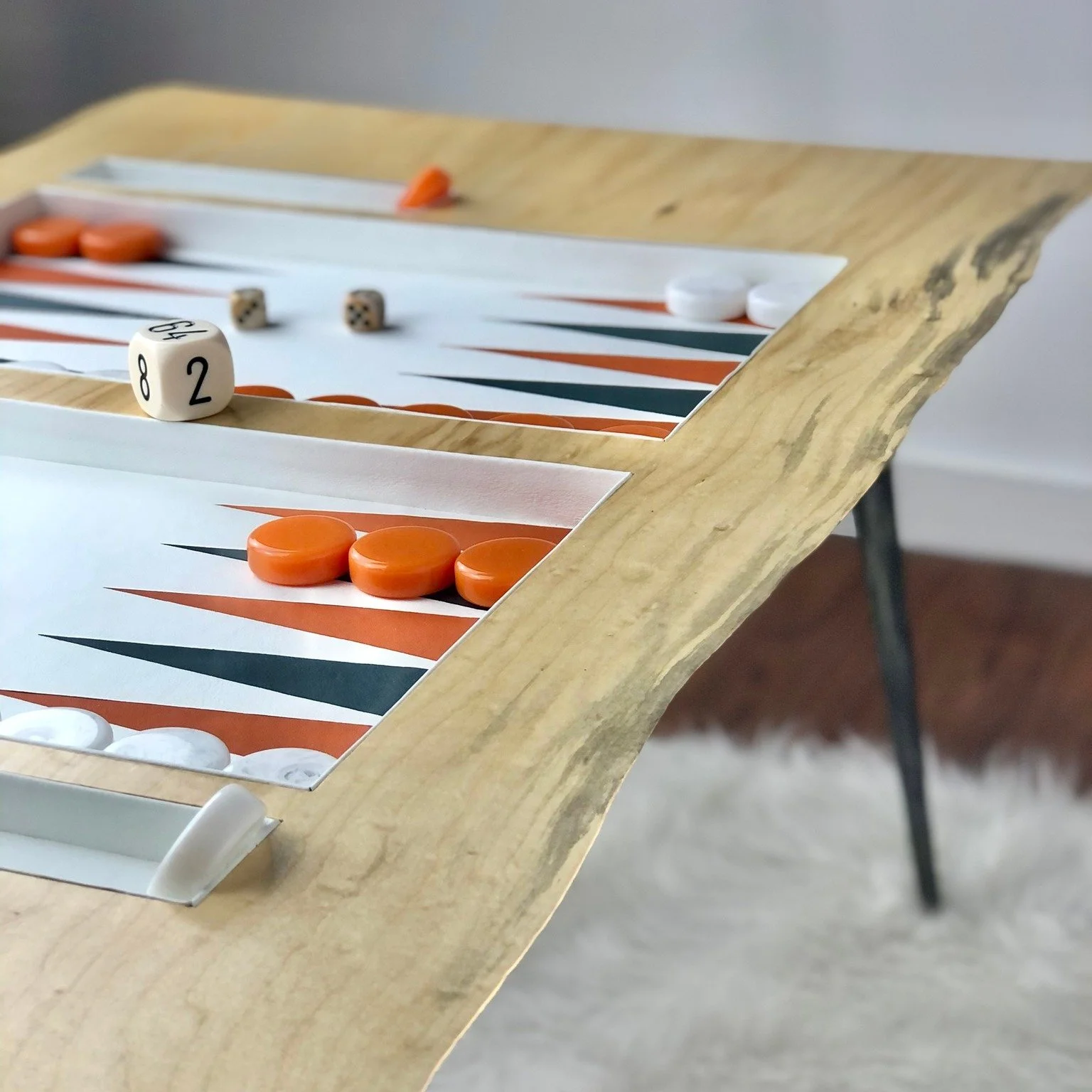 Crush, a beautiful box elder slab that screams for the playing surface and checker colors Kerri combined to make this piece.  Set up as, like many of our tables (NOT ALL) are, a coffee table...an ideal height and includes a glass top.  Domestic shipp