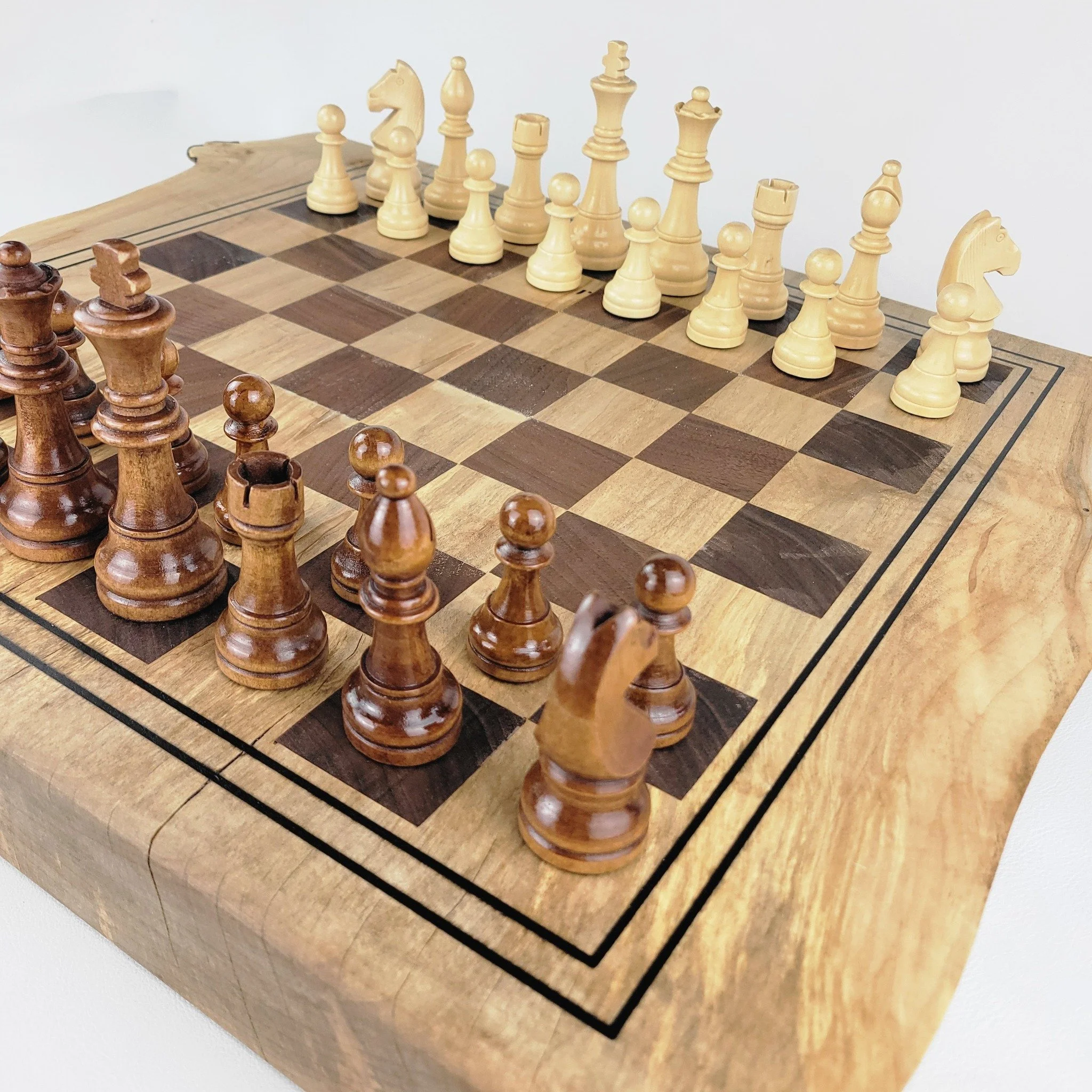 Holiday Time headin' our way!  Is it a chess aficionado on your gift list?  Is it a new board for the chess Master wanting to reclaim her or his inner Queens Gambit?  OR is it the perfect addition to the family or game room - a backgammon/chess board