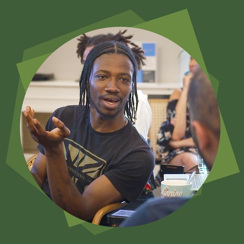 Person speaking during a Dignifi trauma informed group session, illustrating the lived experience approach