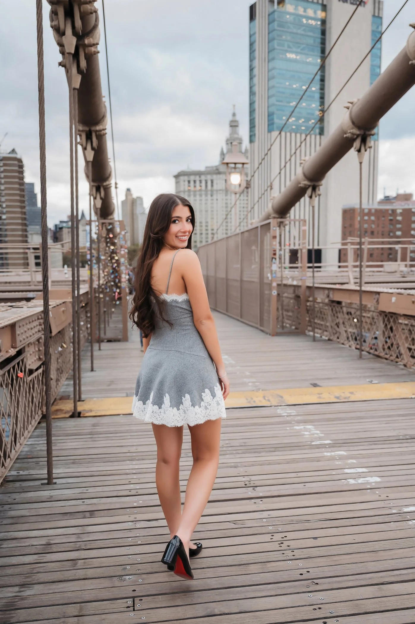 A Professional High School Senior Portrait taken on the Brooklyn Bridge in NYC.