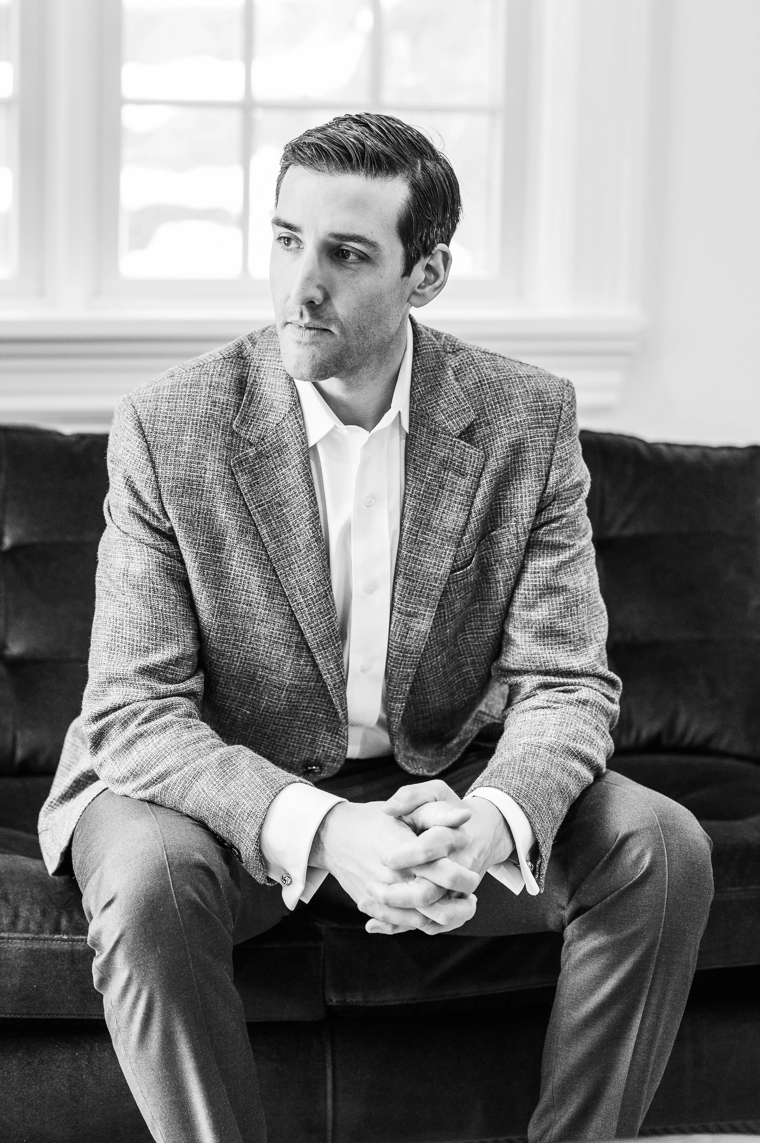 A lifestyle brand image of a financial advisor taken at his office