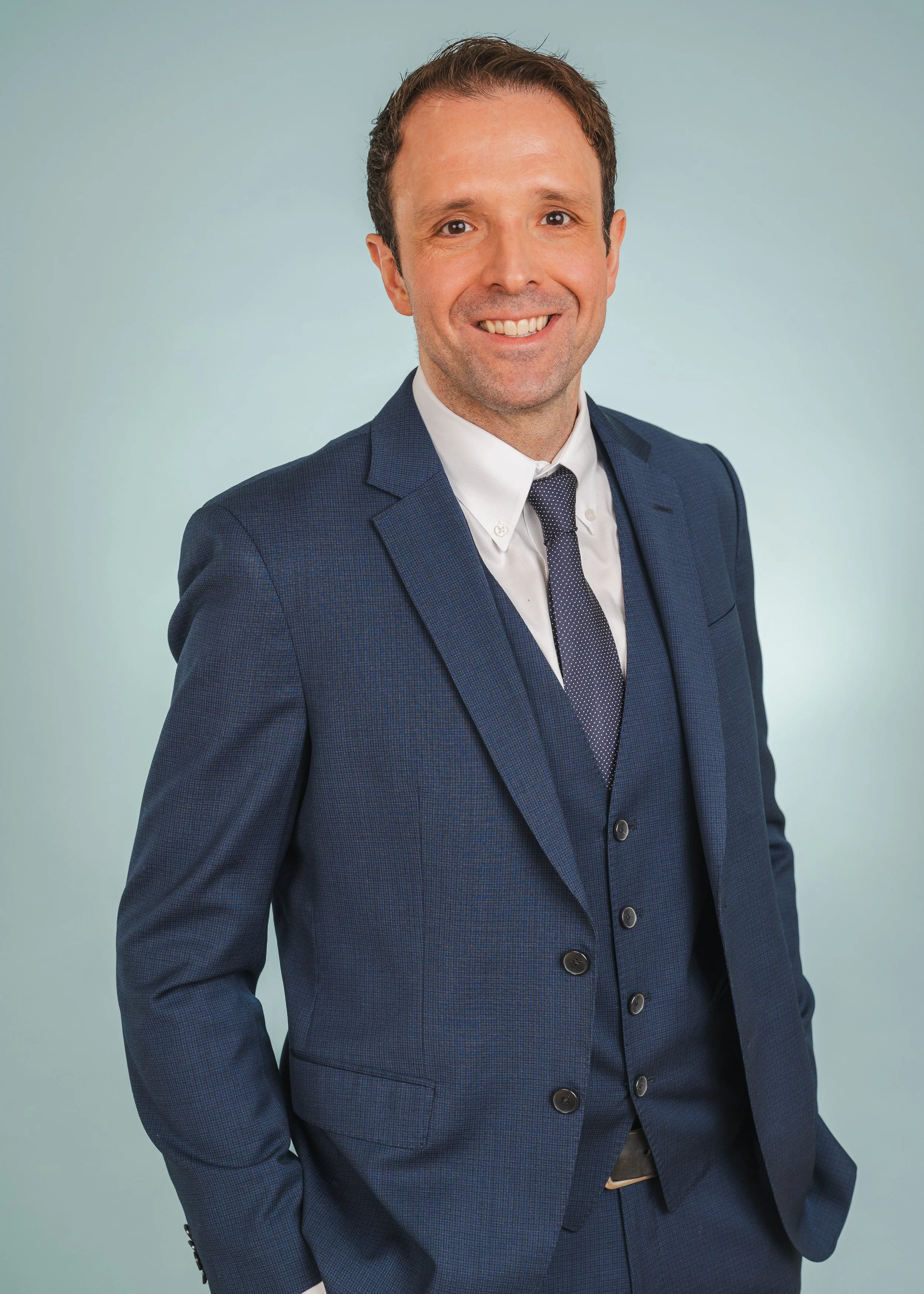 A professional branding headshot of a general counsel taken as part of a brand photoshoot