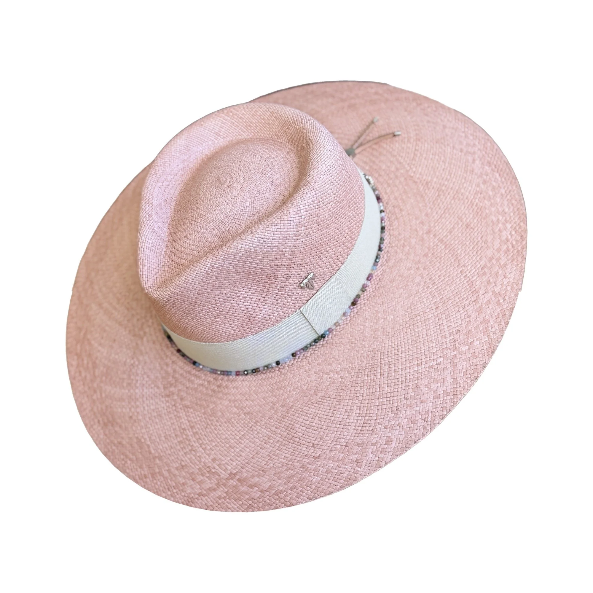 Side view of the ELSIE toquilla straw hat in sunset, by TESH® Palm Beach.