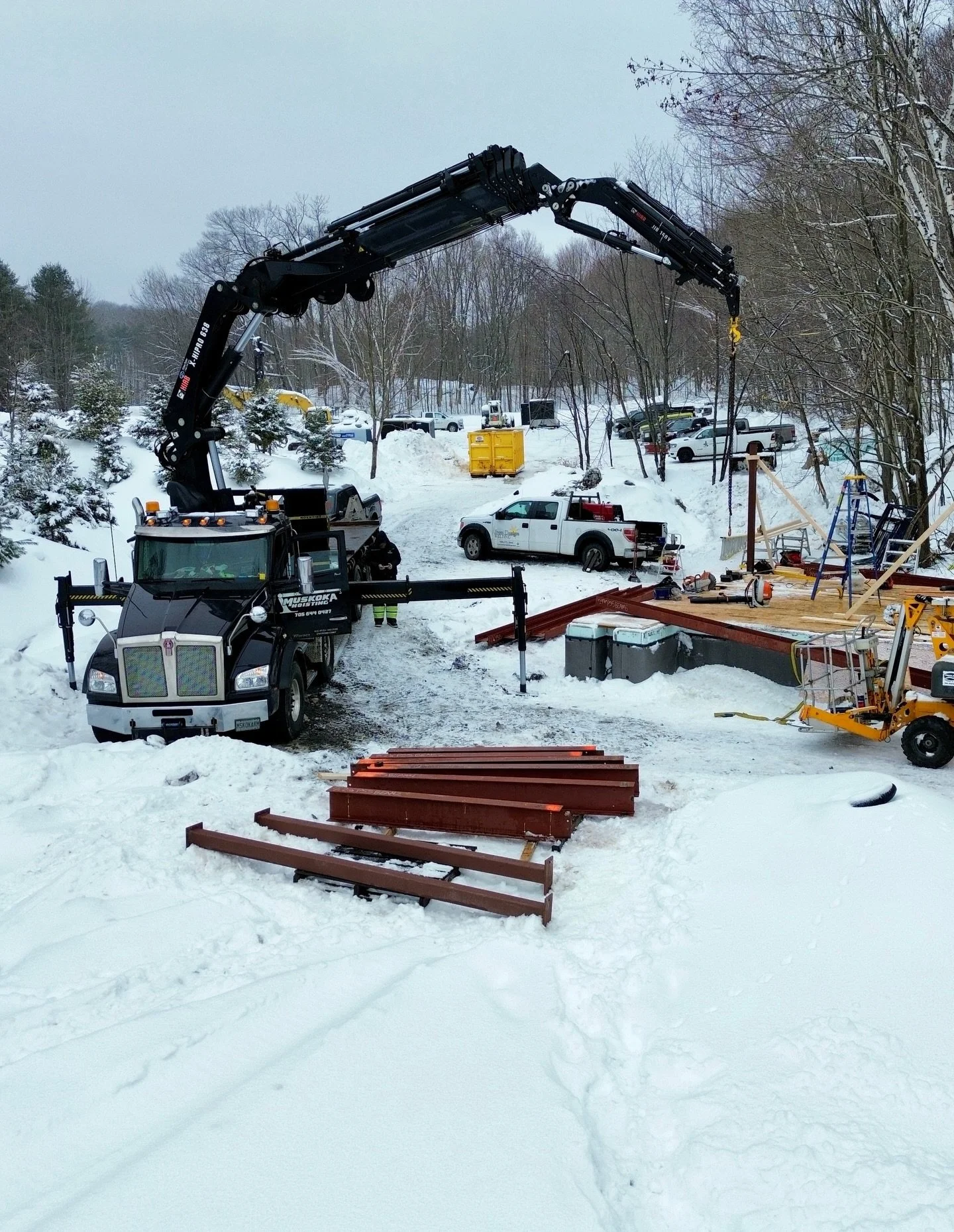 Snow drifts, heavy lifts - thanks for having us @jscustombuilders and @iron.design.welding 💪 

#muskokahoisting #cranelife #boomtruck #crane #muskoka