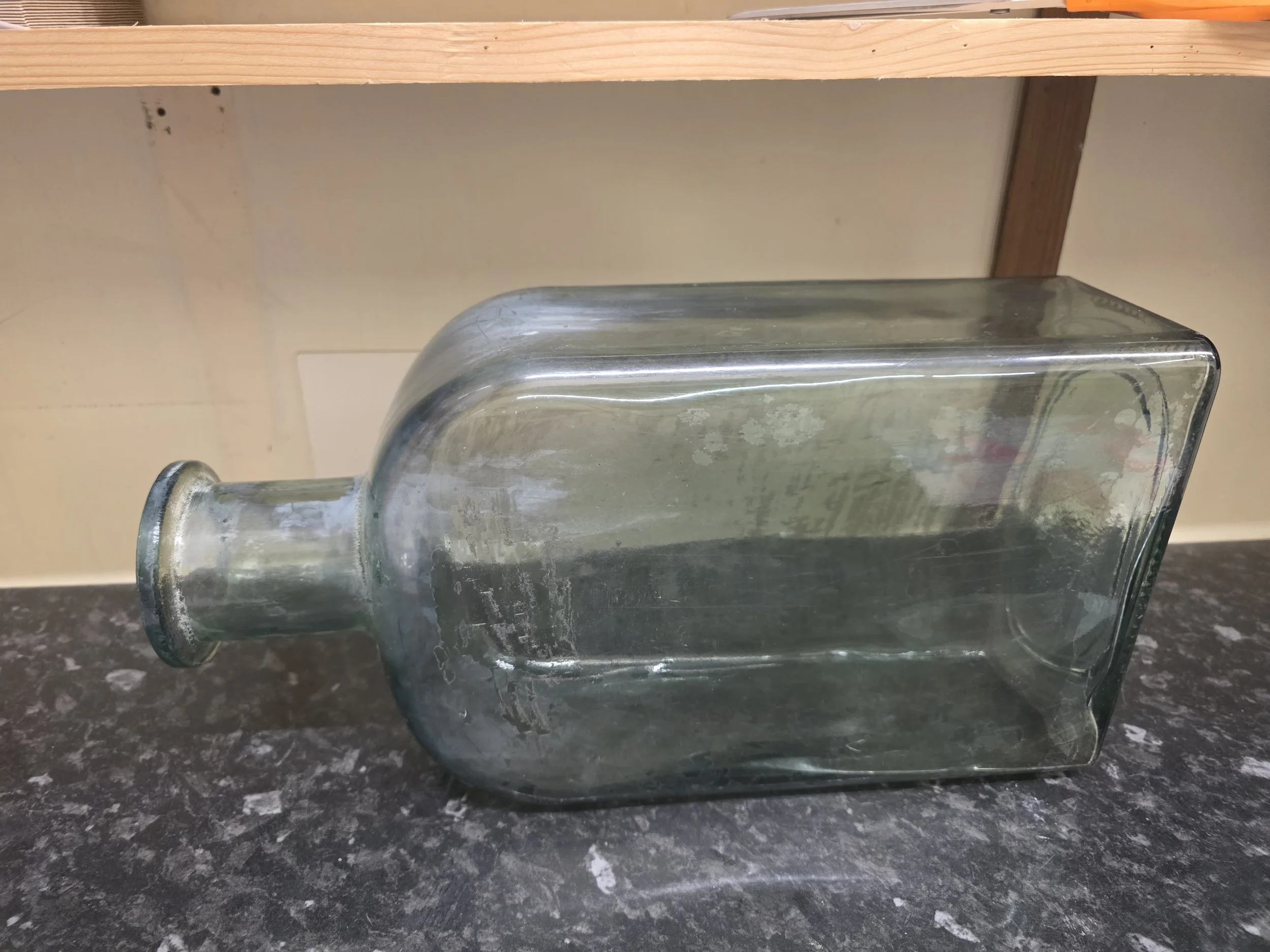 Large glass bottle