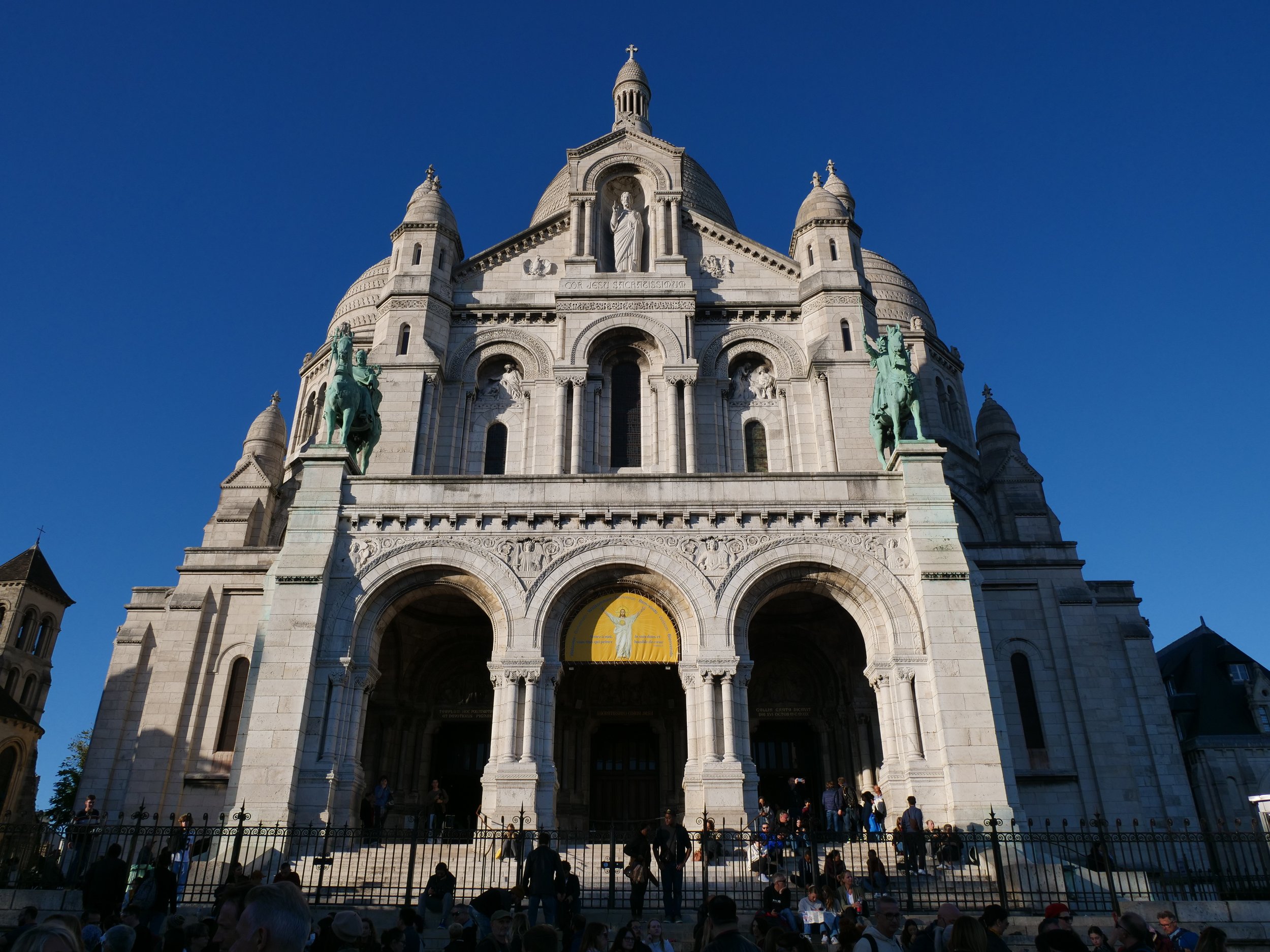 The crown jewel of Montmartre, the Sacré-Cœur Basilica, offers both spiritual beauty and architectural splendor.