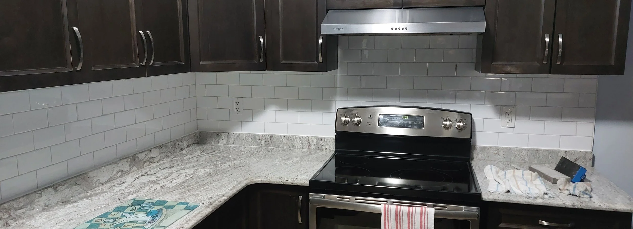white subway tile kitchen backsplash