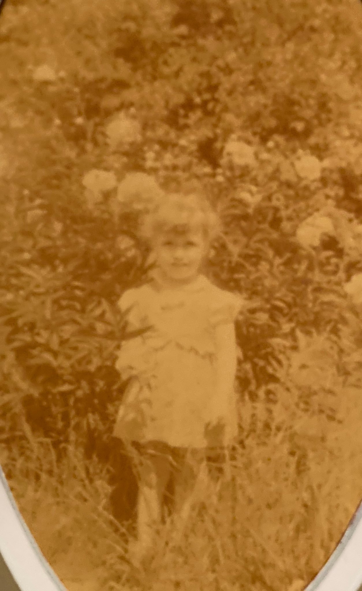 Before — faded childhood photograph
