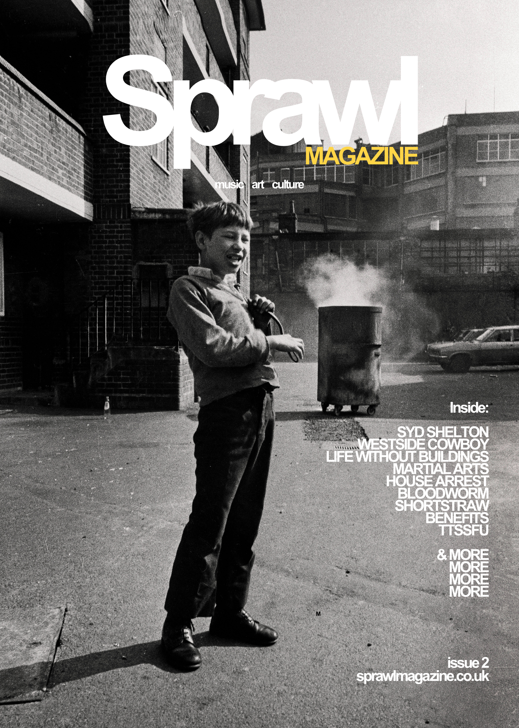 Black and white cover photograph of a young boy standing on a street, smiling and holding an object in his hand. Behind him is an urban setting with brick buildings, cars, and a steaming trash can. The magazine title 'Sprawl' is prominently displayed
