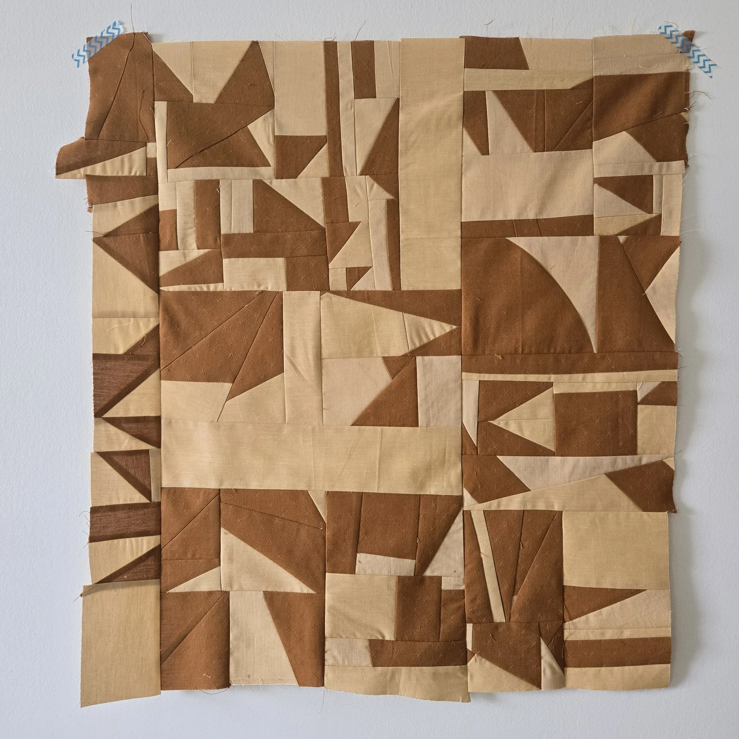 Wild and crazy improv block in brown and a peachy yellow