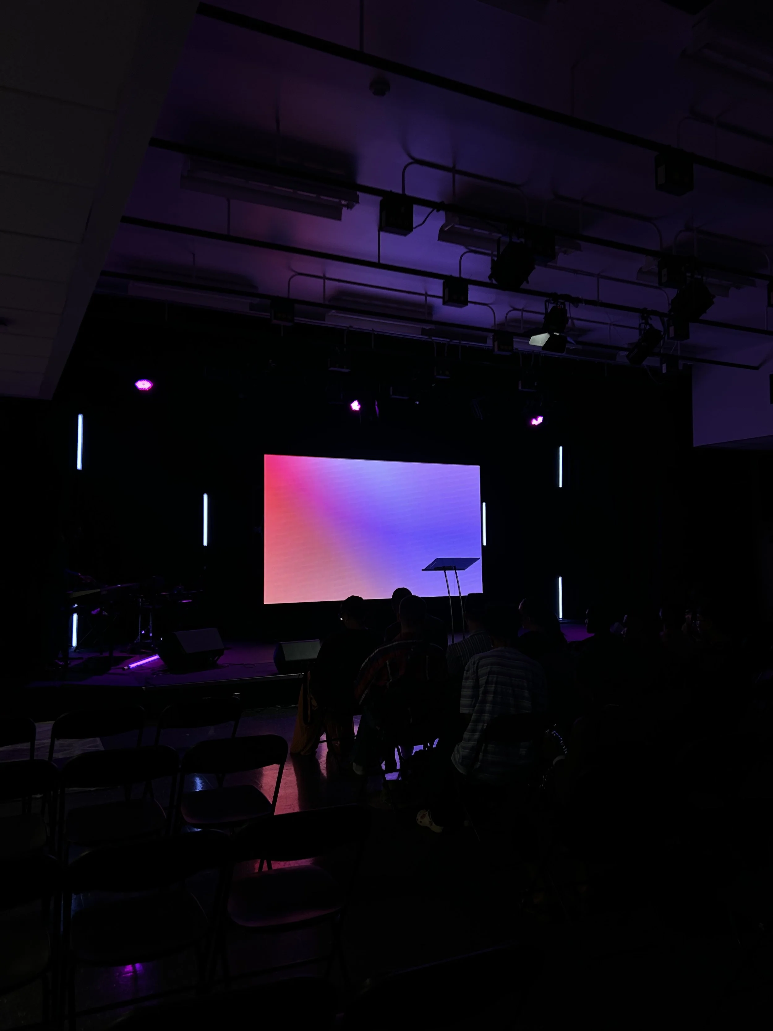 Technical setup for LED wall installation in school auditorium stage