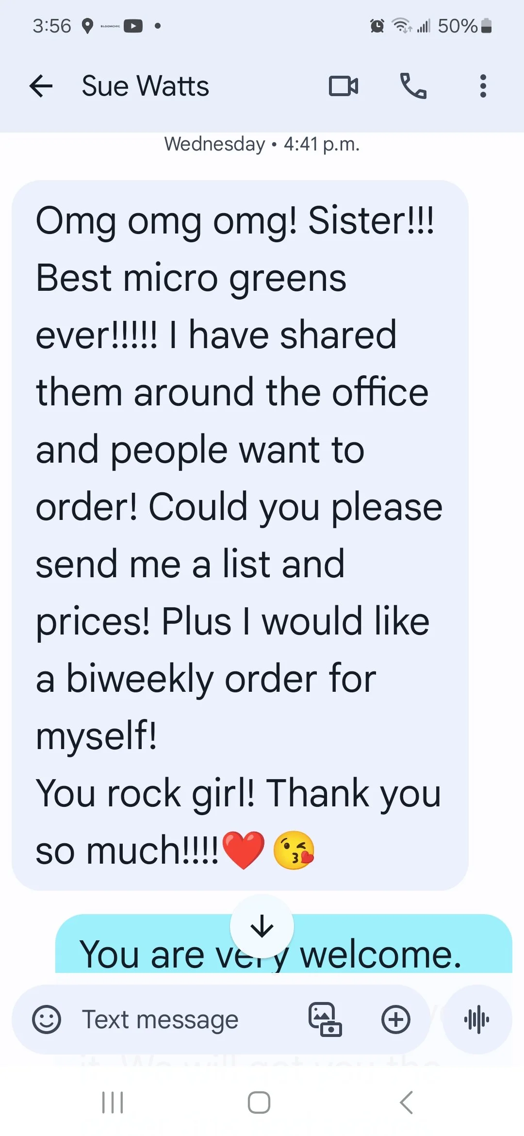 Screenshot of a text message conversation discussing microgreens. The message is positive, with excitement about ordering more and gratitude expressed with heart and kiss emojis.