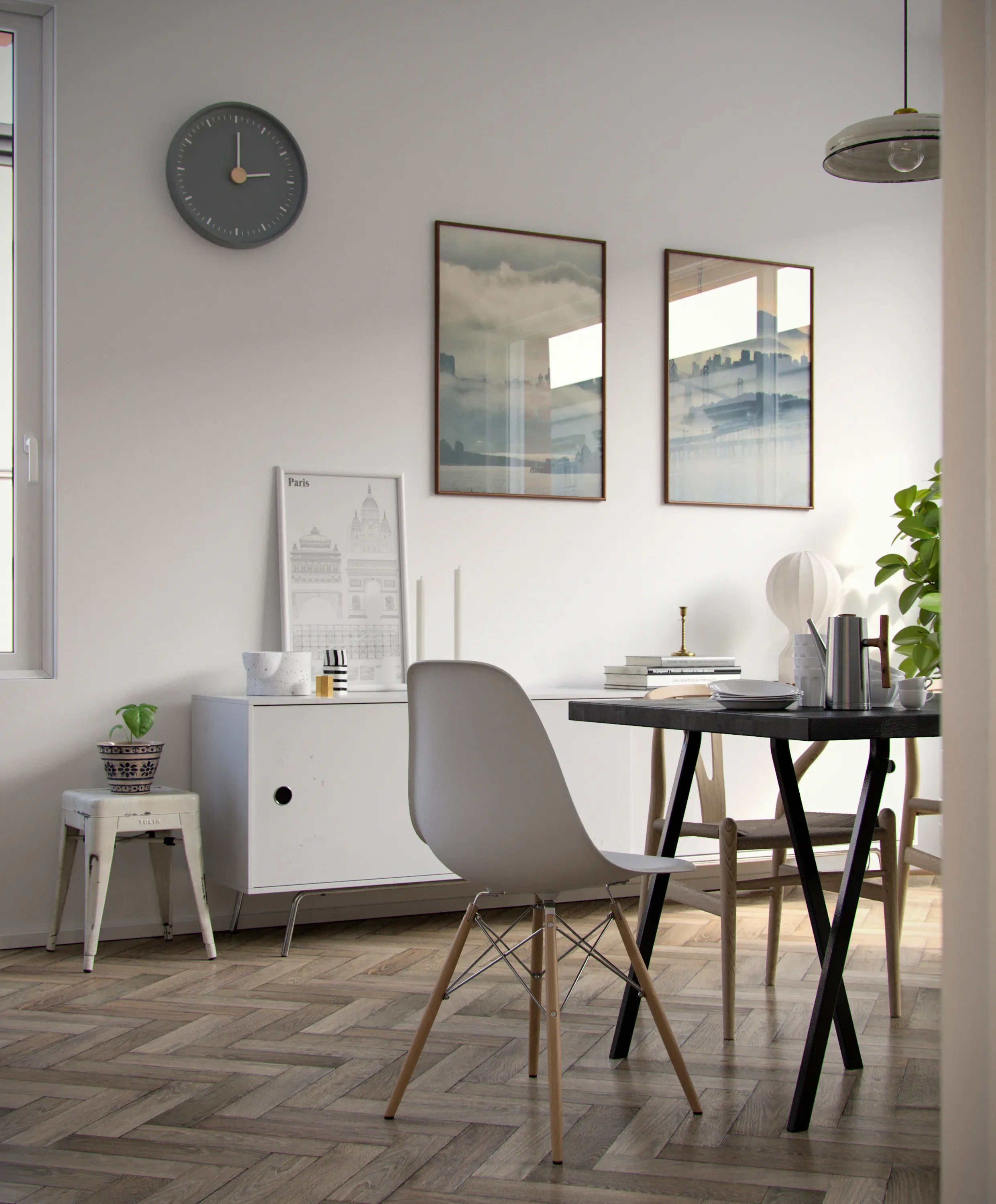 Modern dining area with a white chair, black dining table, wall art, and decorative items.