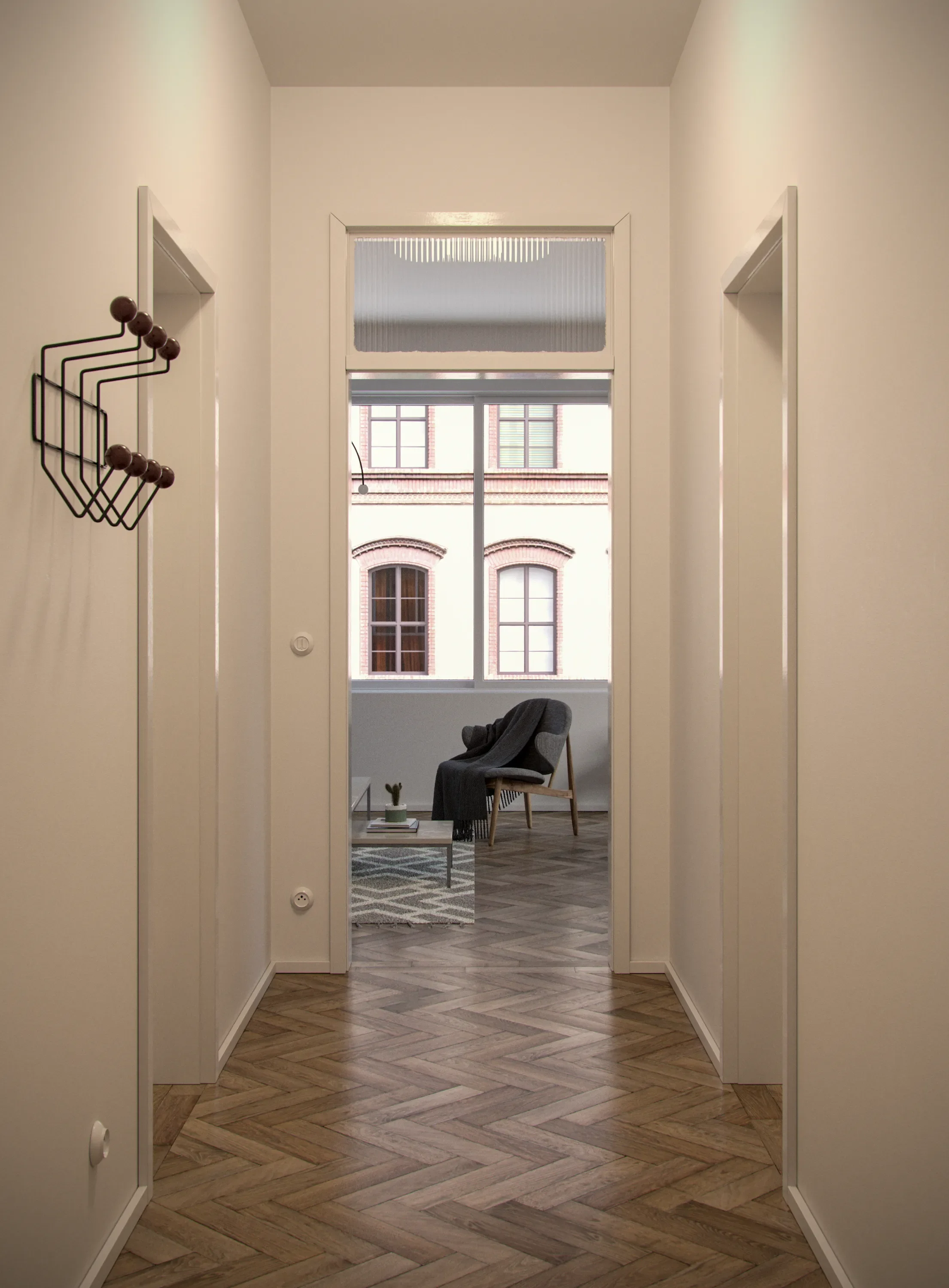 Hallway leading to a living room with a large window, a gray armchair with a blanket, a small table with a cactus and books, and a patterned rug.