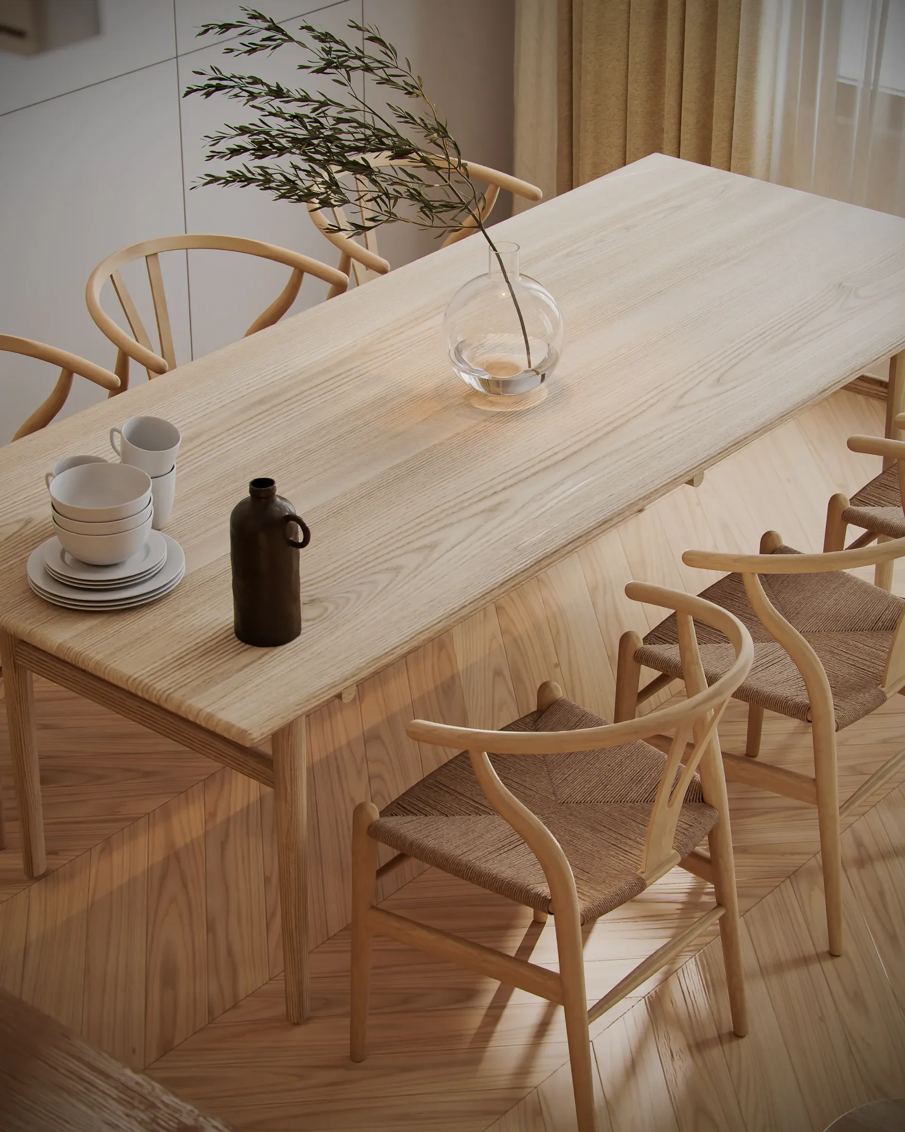 A minimalist dining room table with a glass vase holding a leafy branch, white dishes, a small dark bottle, and wooden chairs with woven seats. | 3D render