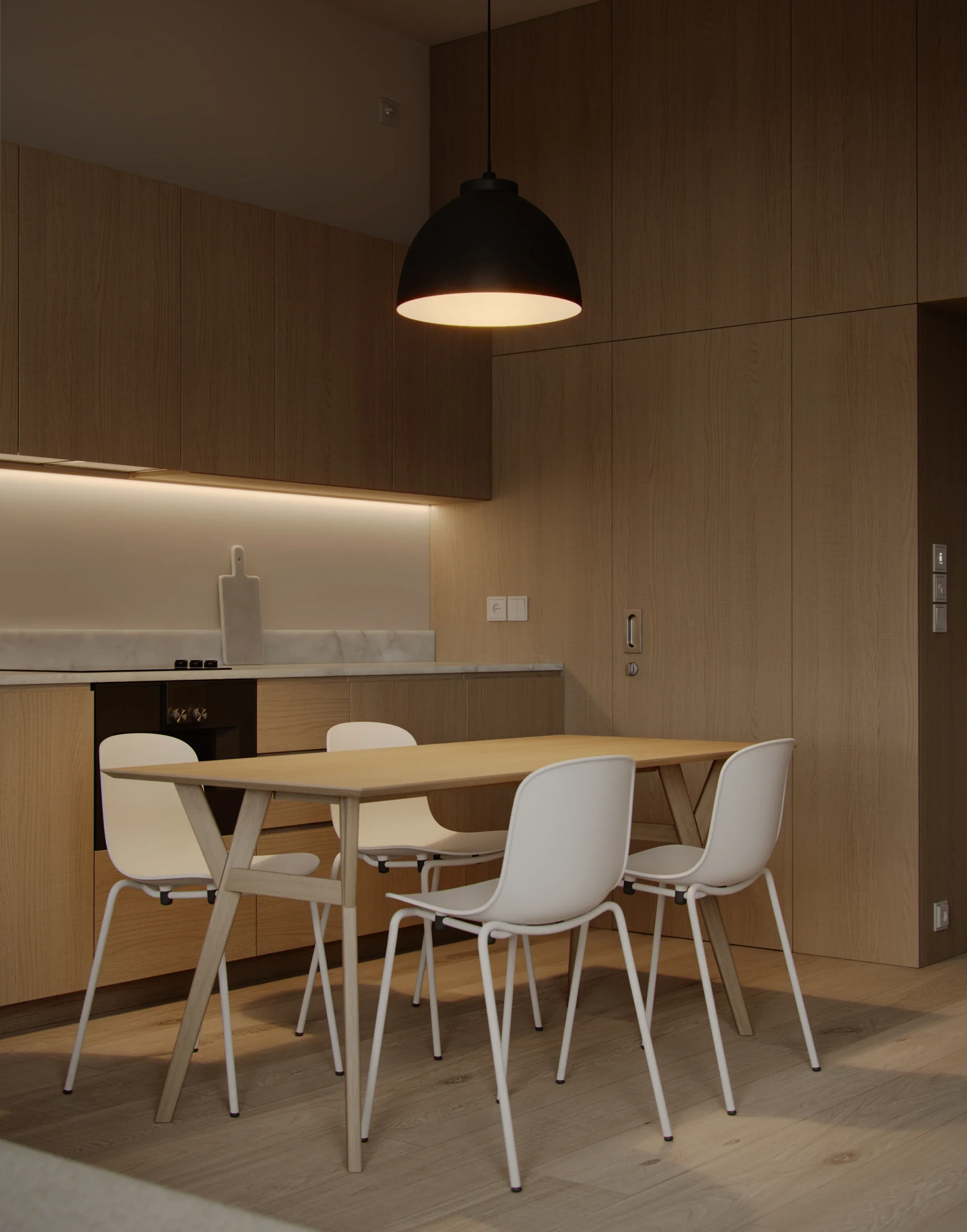 Modern kitchen and dining area with wooden cabinets, a black hanging lamp, a wooden dining table, and white chairs.