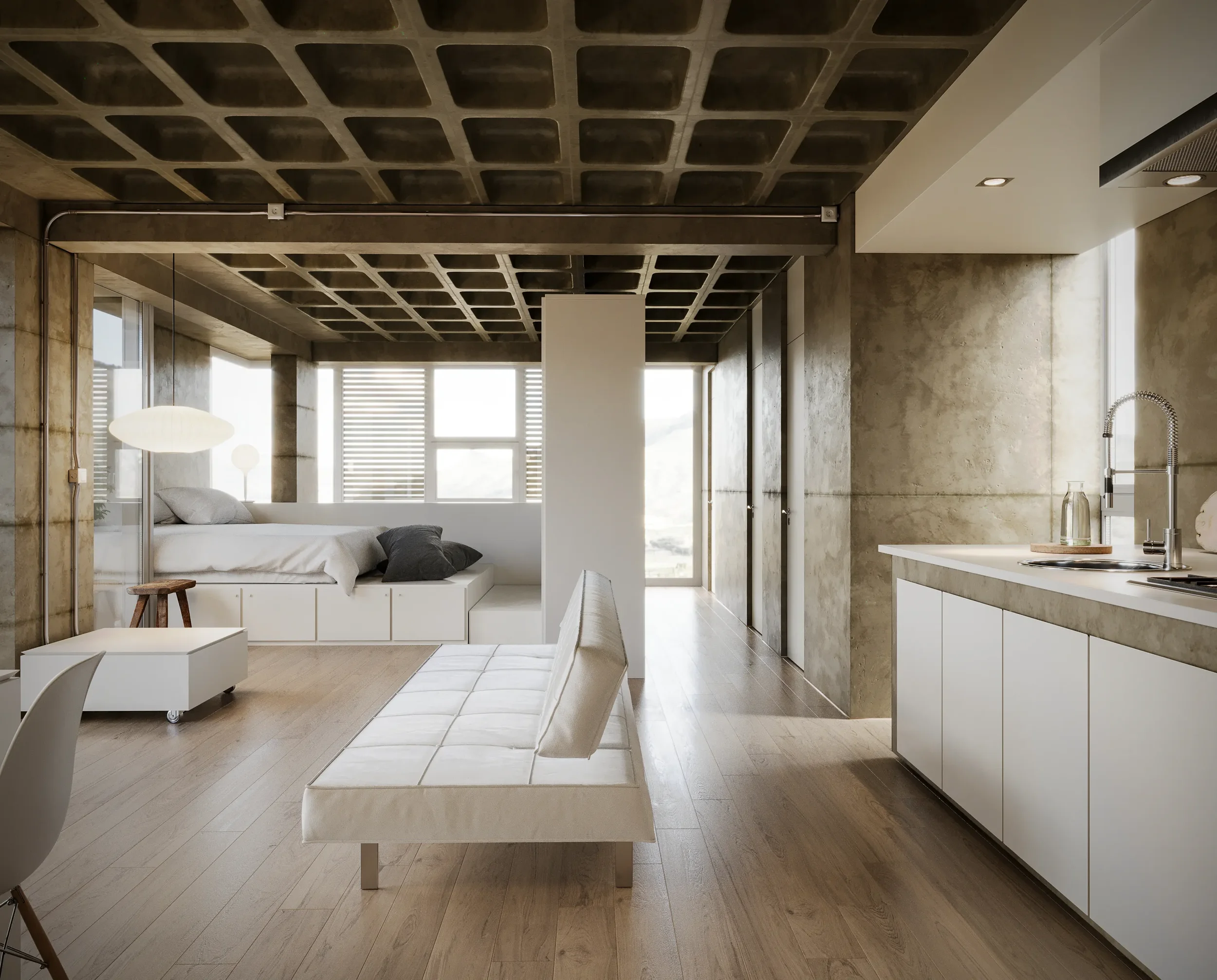 Modern, minimalist studio apartment with a bed, a white bench, and a kitchen area with sink, faucet, and cabinets. Large windows with blinds allowing natural light, wood flooring, and an industrial-style ceiling.