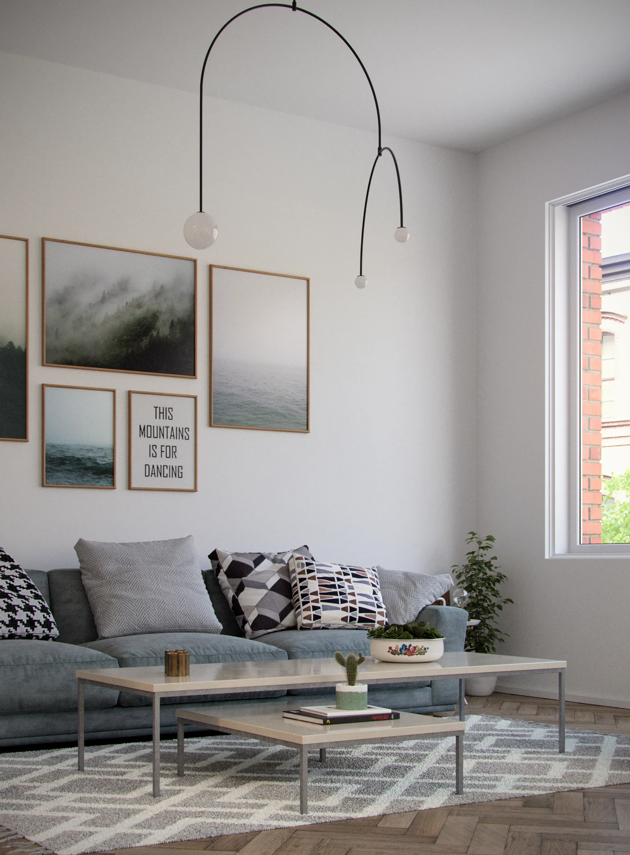 Living room with a light gray couch, patterned pillows, rustic coffee table with decorative items, wall art featuring mountain and ocean scenes, a window with a brick building outside, and a minimalist black light fixture hanging from the ceiling.