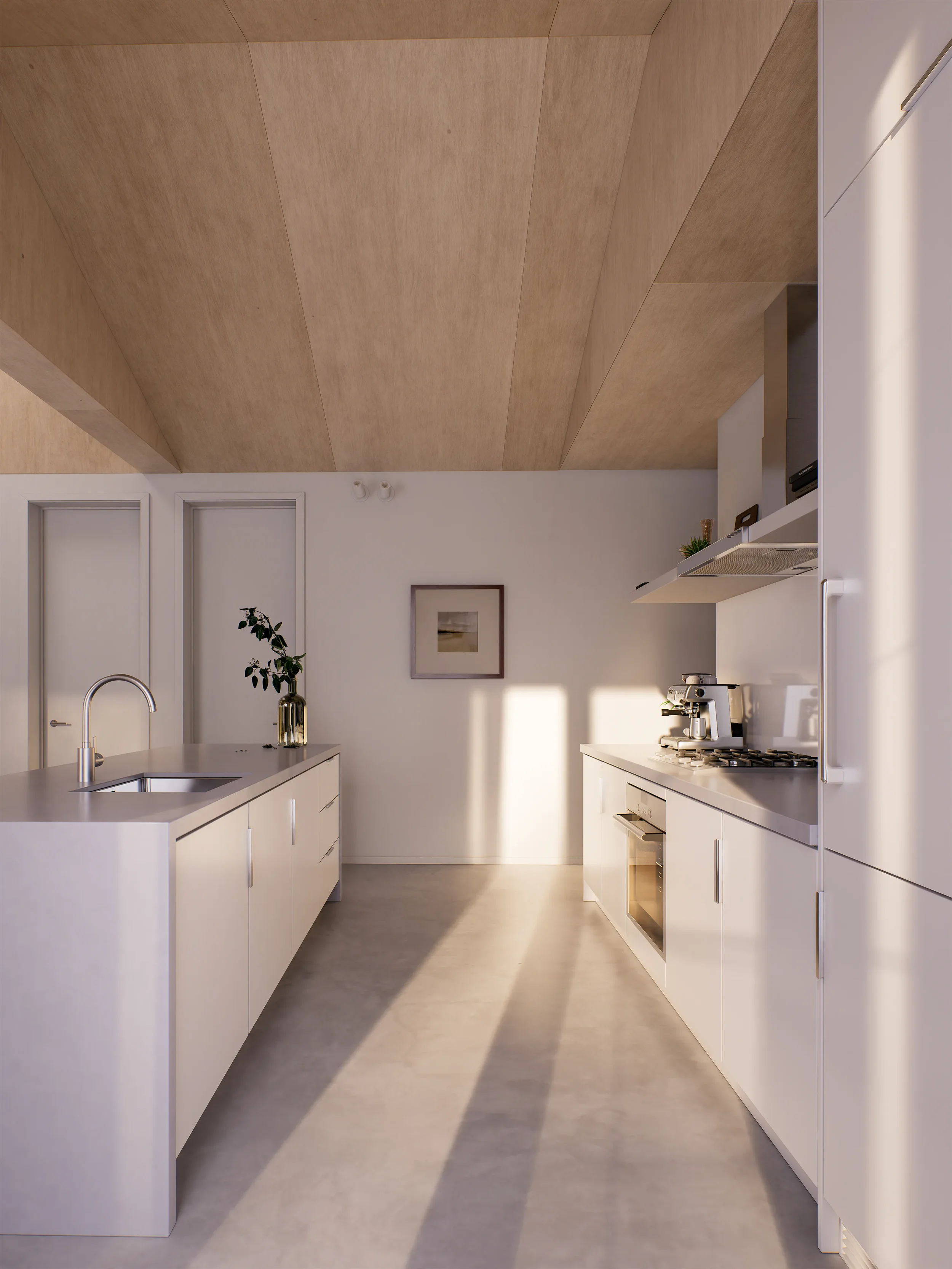 Modern, minimalist kitchen with white cabinets, a built-in oven, a coffee machine, and a sink with a plant on the counter, illuminated by natural sunlight.