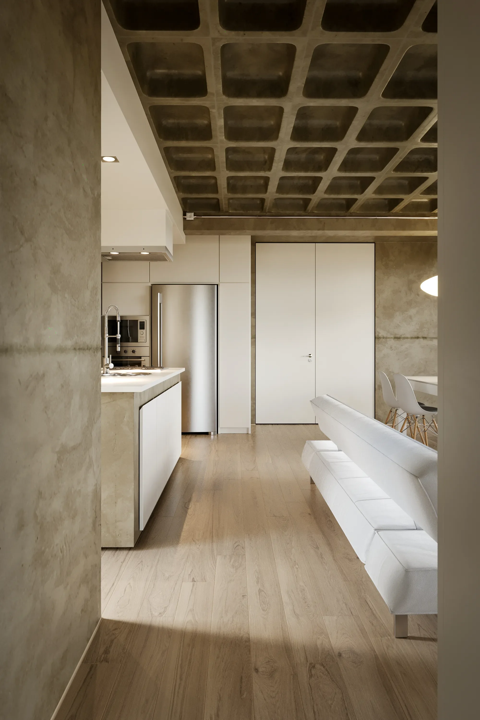 Modern kitchen and dining area with white cabinets, a stainless steel refrigerator, a white dining table with white chairs, and a wood floor.