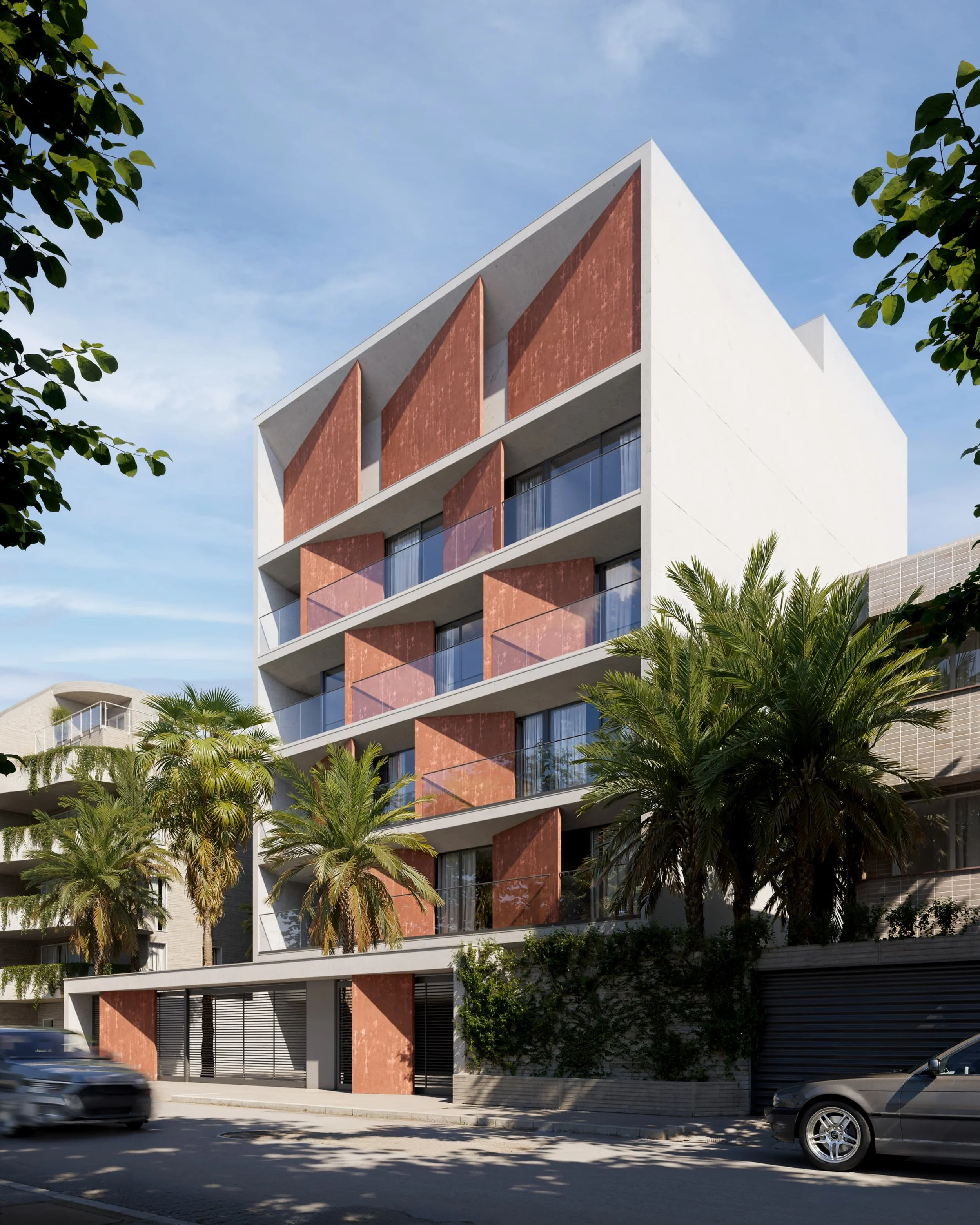 Modern multi-story apartment building with white and rust-colored panels, glass balconies, and palm trees in the foreground under a blue sky.