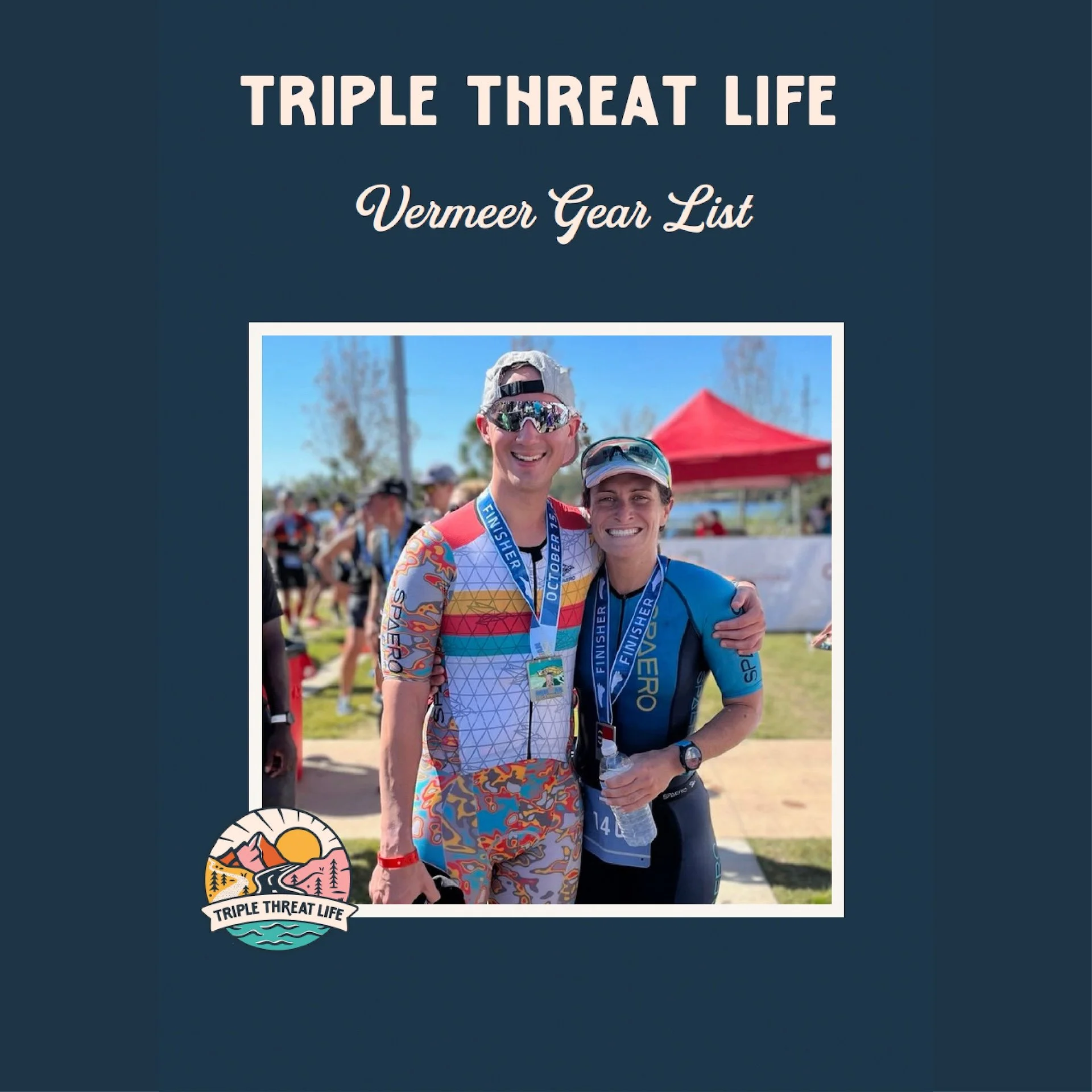 Two triathletes standing at a finish line with medals